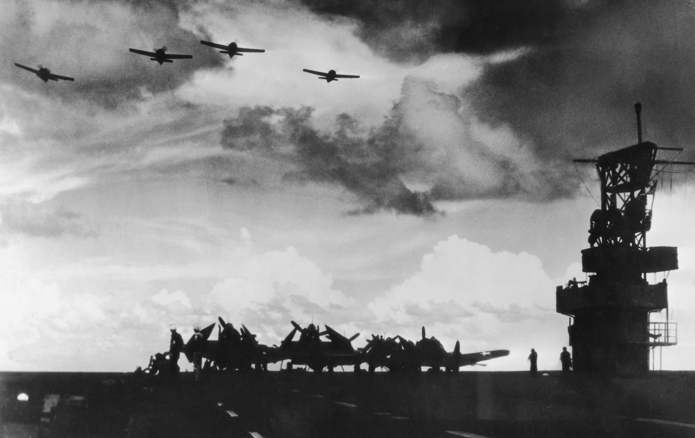 U.S. Navy bombers in flight over their carrier, circa 1944, the year the first African-American sailors were selected for the Navy's Officer Candidate School. (Getty Images)