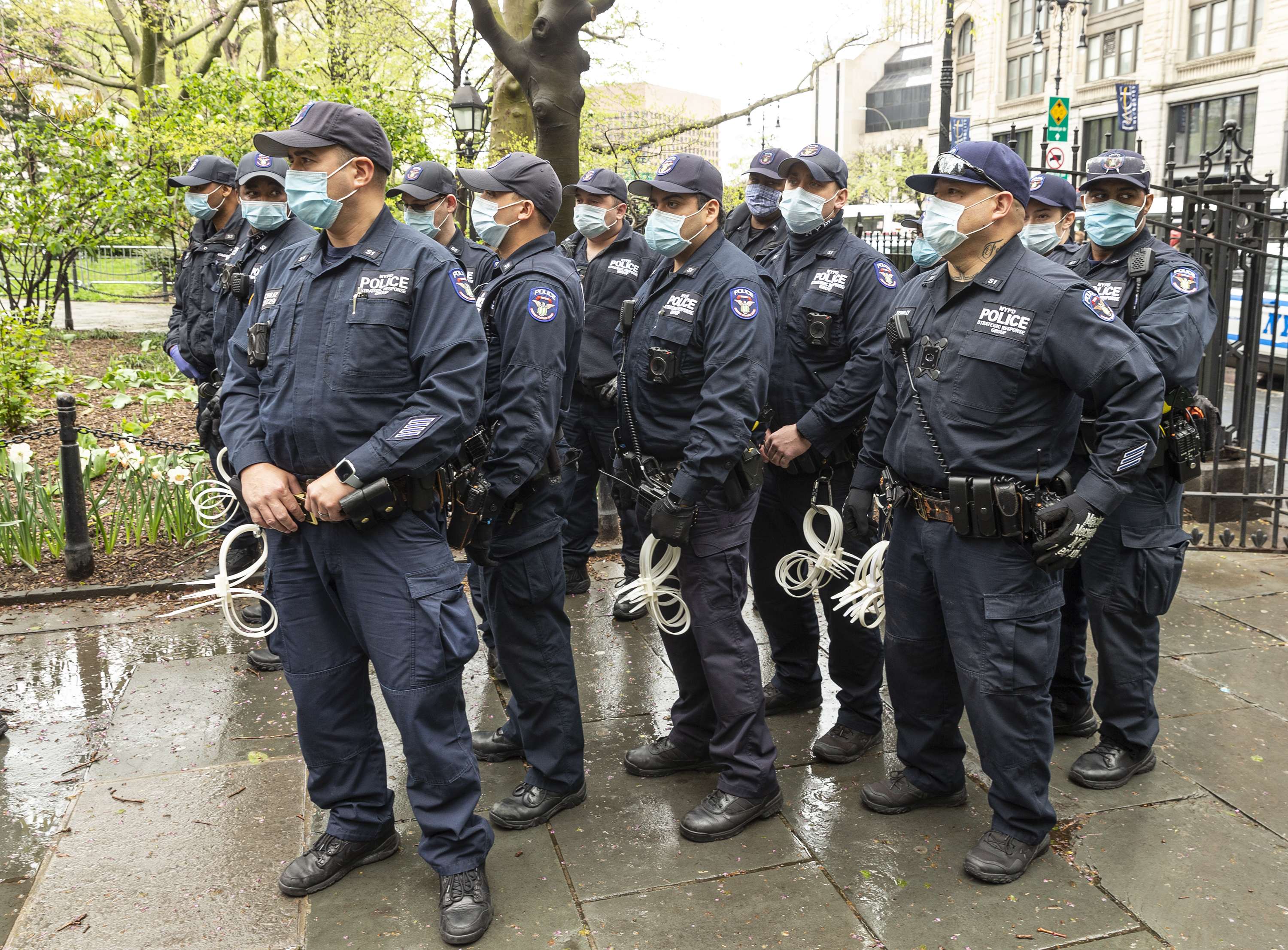 Police officers watch as activists hold small Make America Great Again (MAGA) rally in City Hall Park advocating for reopening New York state regardless of COVID-19 pandemic. (Lev Radin—Pacific Press/Getty Images)