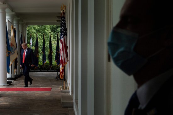 President Trump arrives at a news conference in the Rose Garden on May 11 wearing no mask, despite CDC guidelines advising Americans to use them