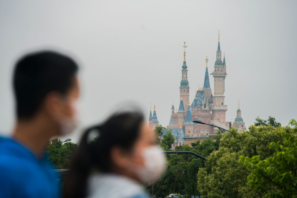 Tourists near Disneyland on May 5, 2020 in Shanghai, China. (Hu Chengwei–Getty Images)