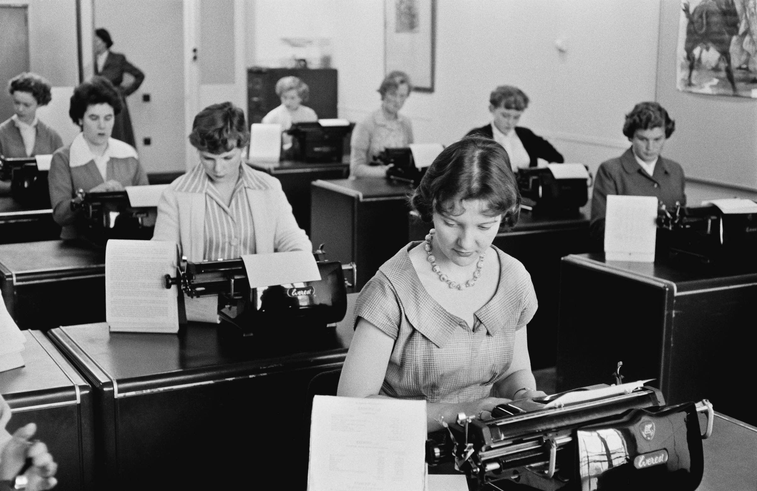 Typists at work at Unilever House in Blackfriars, London, September 1955. (Getty Image)