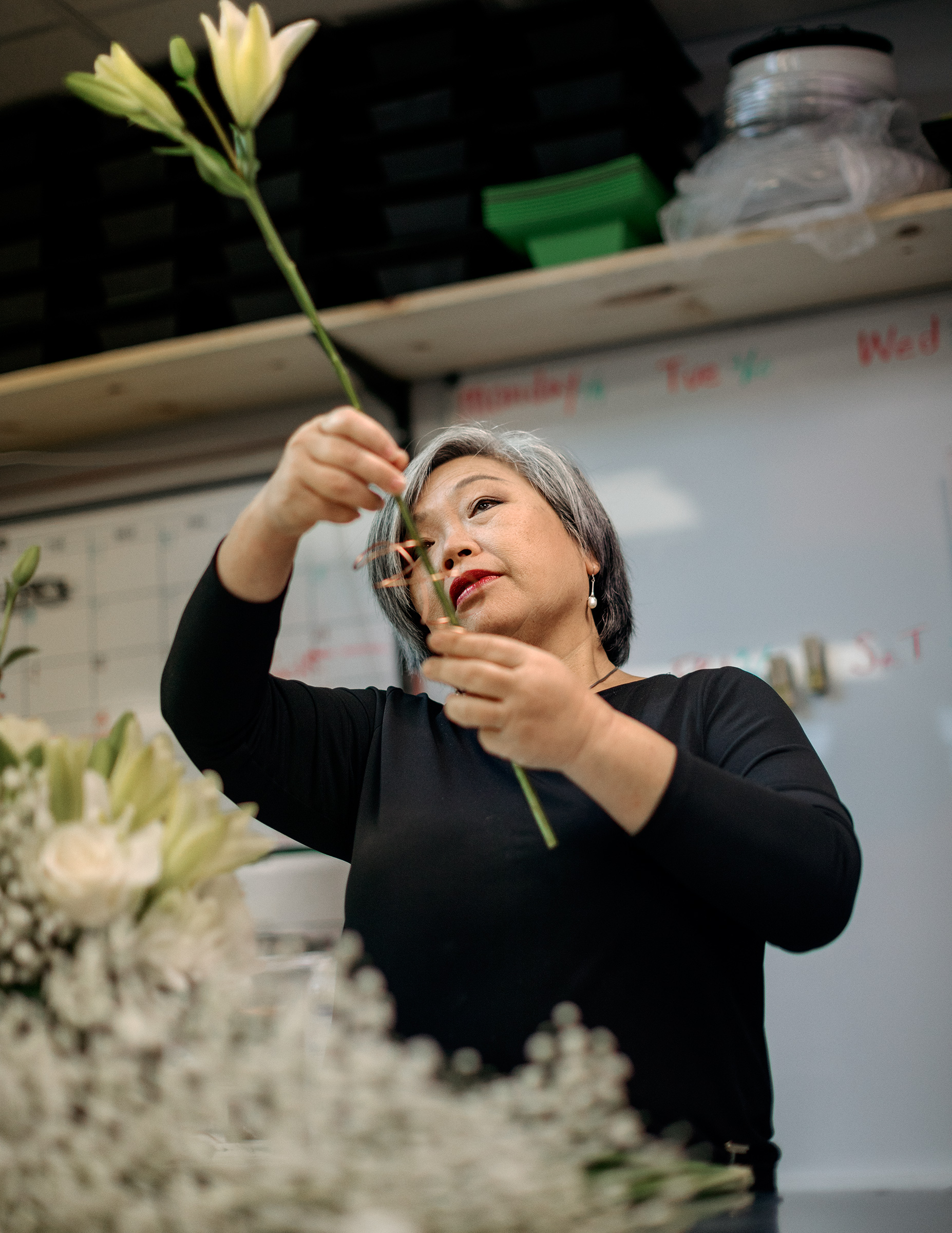 <strong>Eileen Cheng, 60, Florist, Fort Lauderdale, Fla.</strong> “Everything just went down to zero,” says Cheng, who has owned Yacht Flowers with her daughter since 2009. The shop primarily provided arrangements to private yachts, but few people are making use of luxury pleasure cruisers lately. Cheng is worried about what this could mean for her retirement: “I’m asking myself, Am I able to recover?” (Rose Marie Cromwell for TIME)