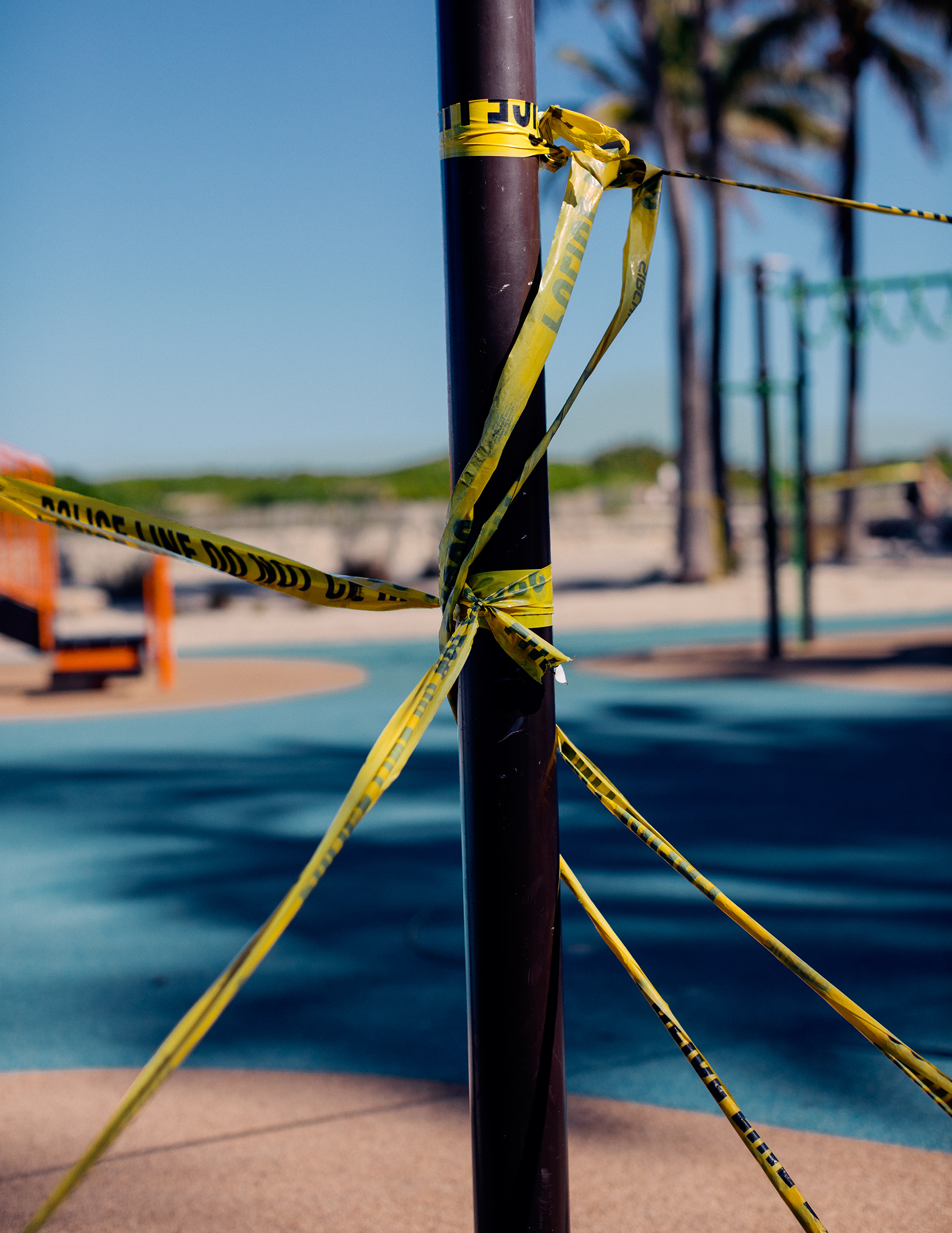 A playground in front of the temporarily closed Betsy Hotel is covered in caution tape as parks remain closed in Miami Beach. (Rose Marie Cromwell for TIME)