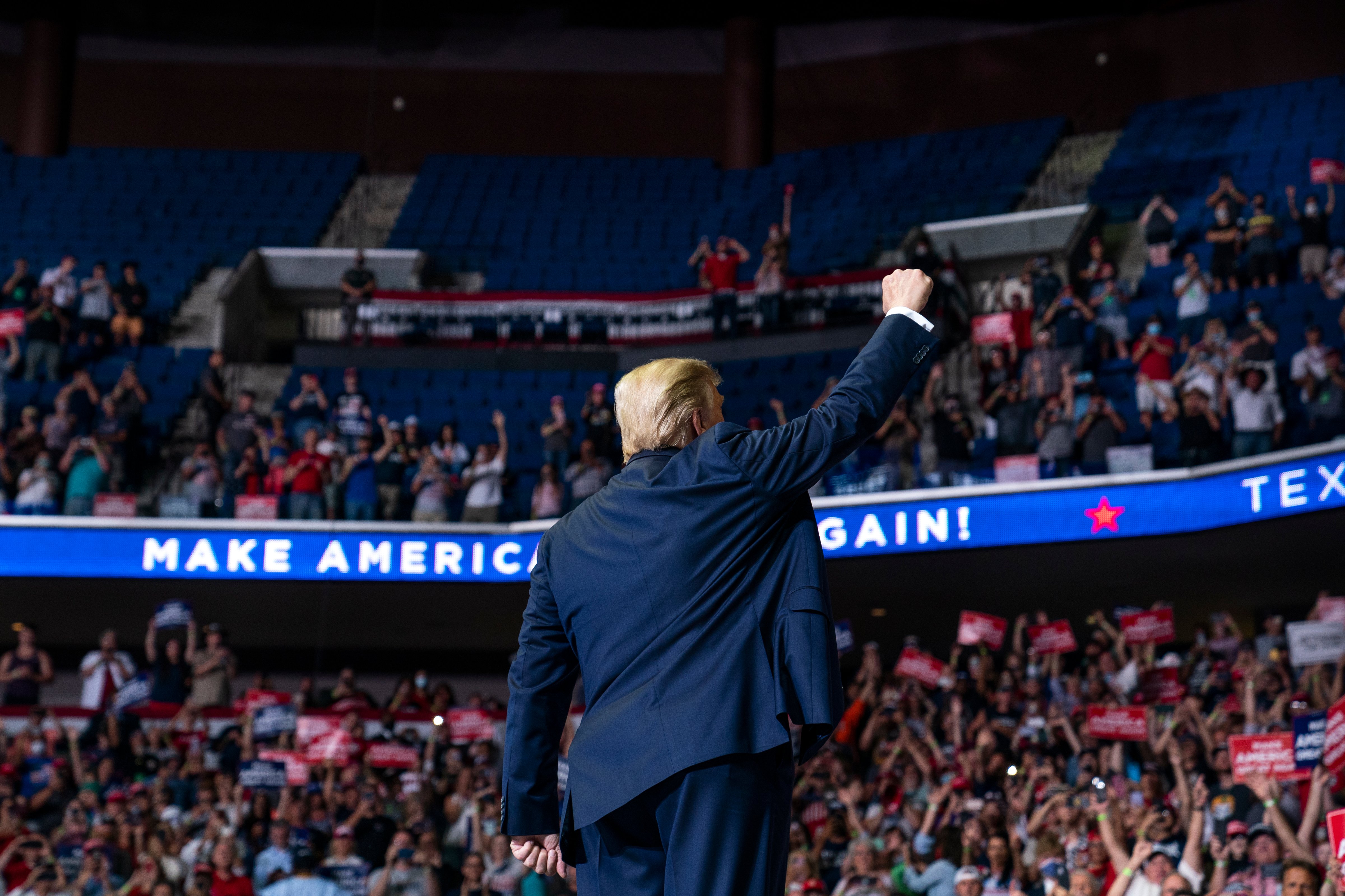 President Donald Trump arrives on stage to speak at a campaign rally at the BOK Center, on June 20, 2020, in Tulsa, Okla. (Evan Vucci—AP)