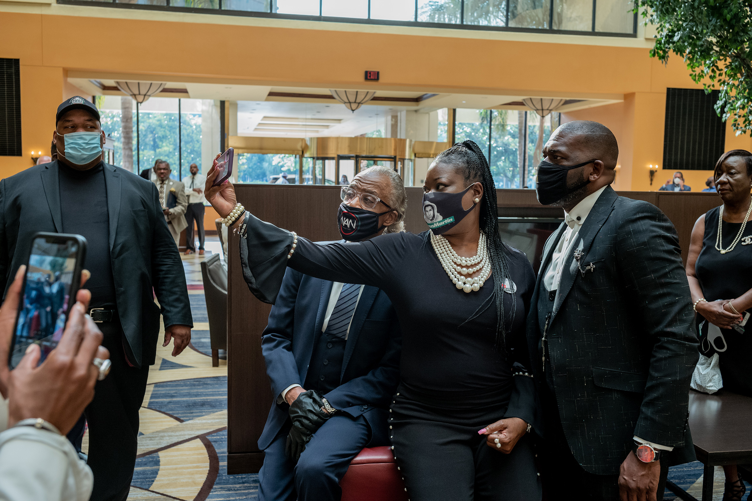 Rev. Al Sharpton takes a photograph with Sybrina Fulton and Pastor Jamal H Bryant before George Floyd's funeral on June 9. (Ruddy Roye for TIME)