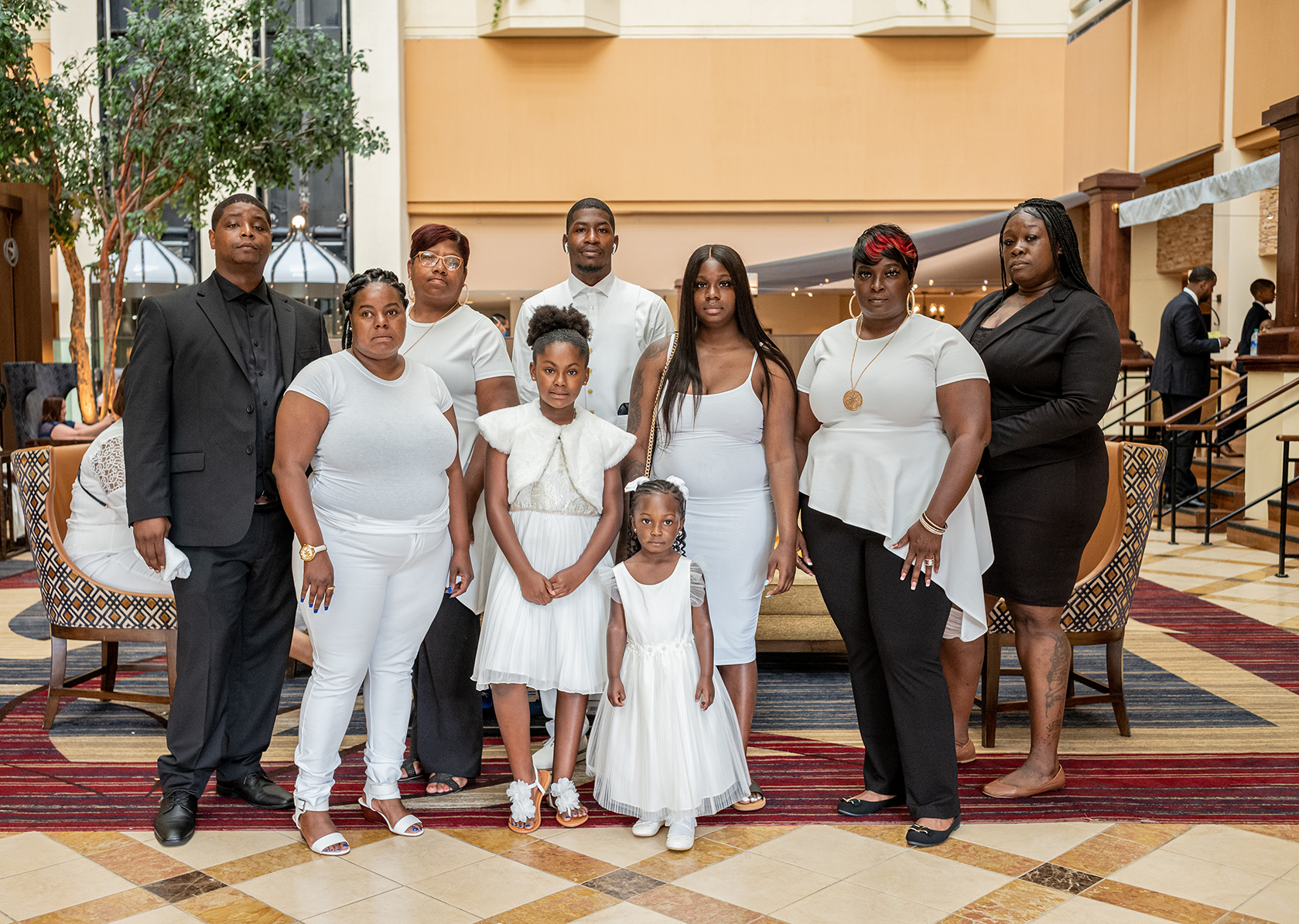 Quincy Mason and his family pose for a photo before the funeral on June 9. (Ruddy Roye for TIME)