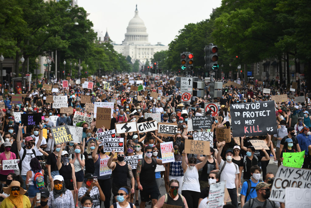WASHINGTON, DC - JUNE 6: Civil rights advocates march in Washin