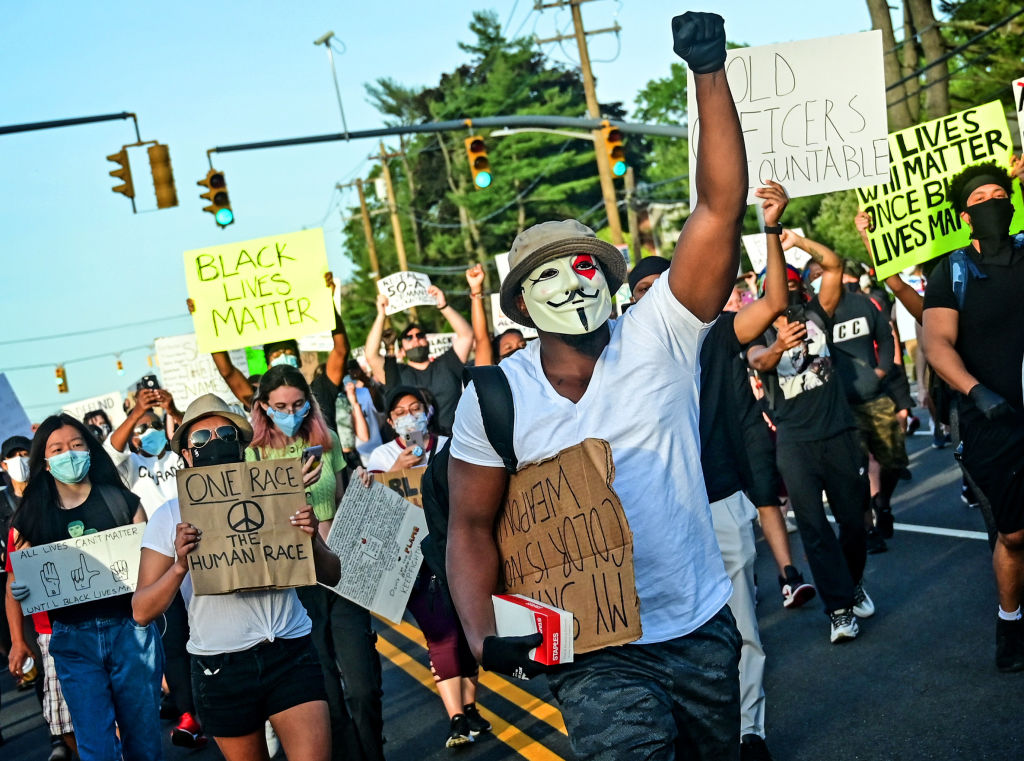 Masked protesters march peacefully against racism on Long Island