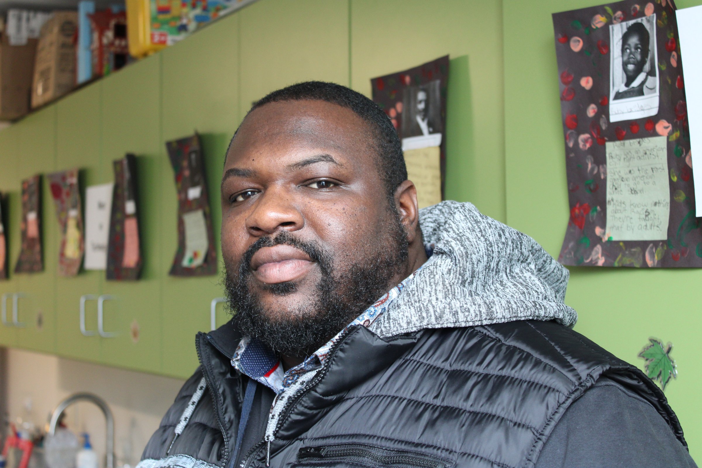 In his work with black teenagers, pastor and mental health caseworker Darnell Hill teaches an unofficial guide to what he calls “living while black.” Though many black families have their own sets of rules to navigate others’ racist assumptions, Hill says he hopes that following his “do’s and don’ts” will allow kids to survive as unscathed as possible to realize their life ambitions. “Let’s just make it home,” Hill tells them. (Cara Anthony/KHN)