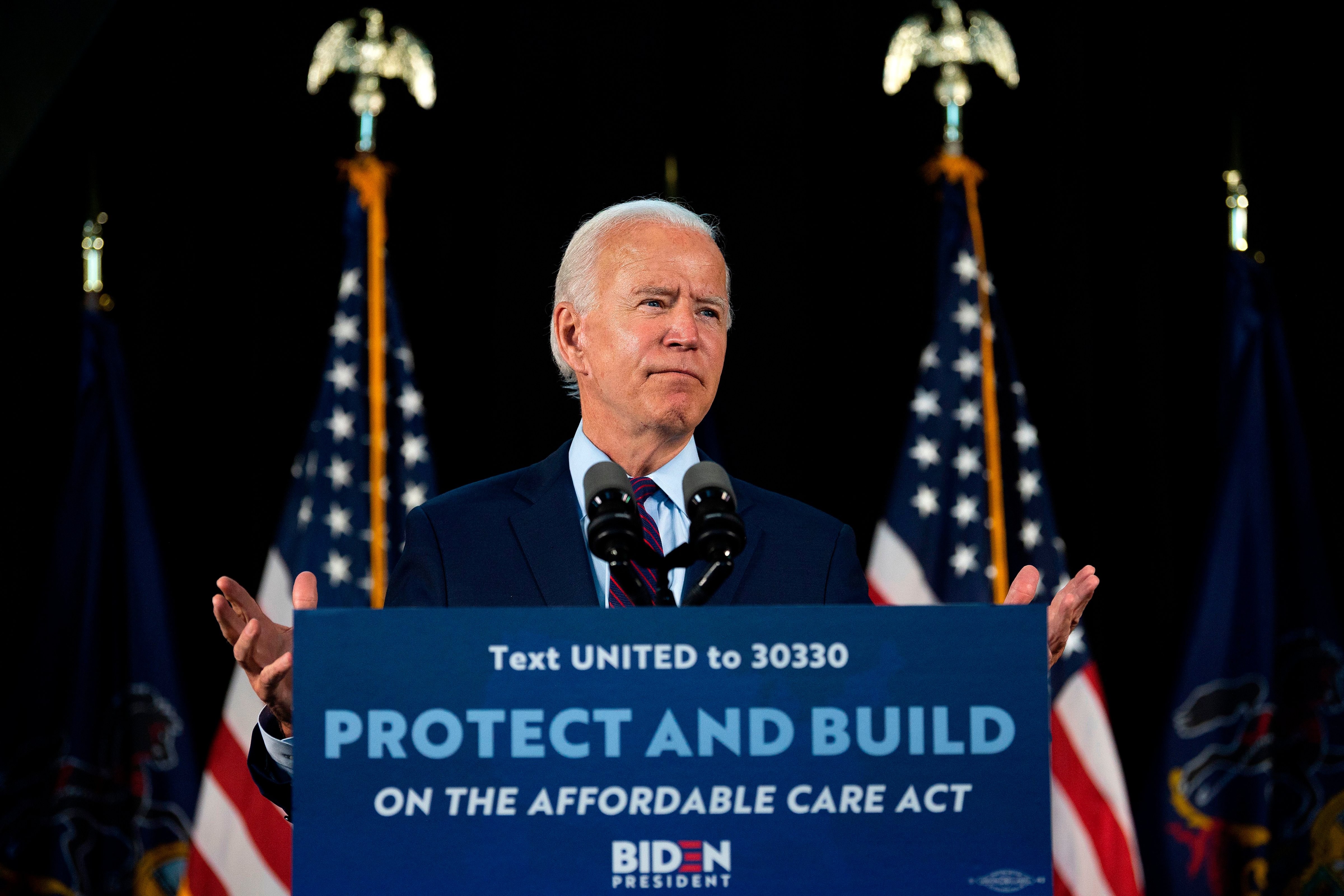 Democratic presidential candidate Joe Biden delivers remarks after meeting with Pennsylvania families who have benefited from the Affordable Care Act on June 25, 2020 in Lancaster, Pennsylvania. (Jim Watson—AFP/Getty Images)