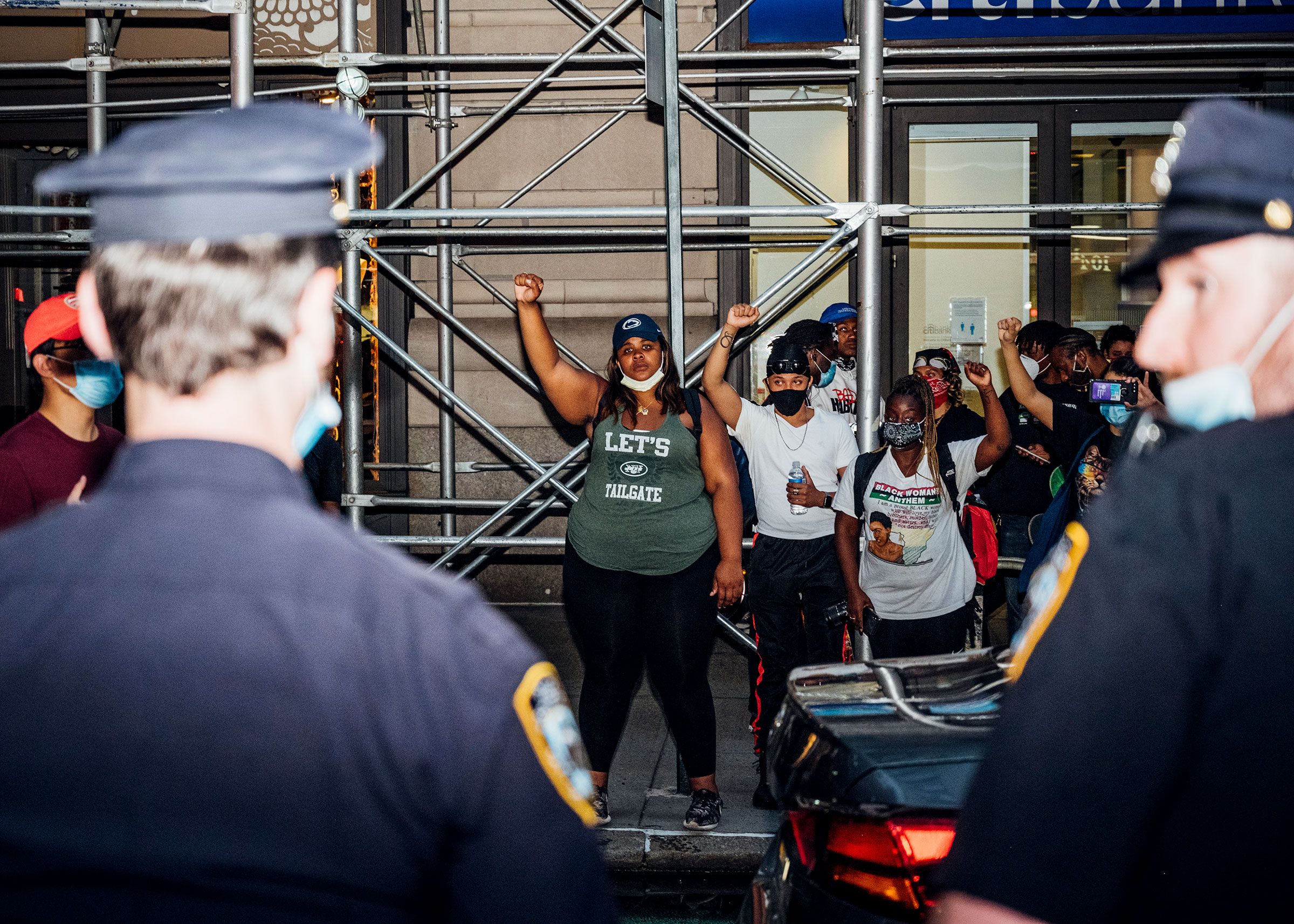 In the wake of George Floyd's death, protesters face off with police officers during another night of demonstrations in Manhattan on May 30, 2020. (Malike Sidibe for TIME)