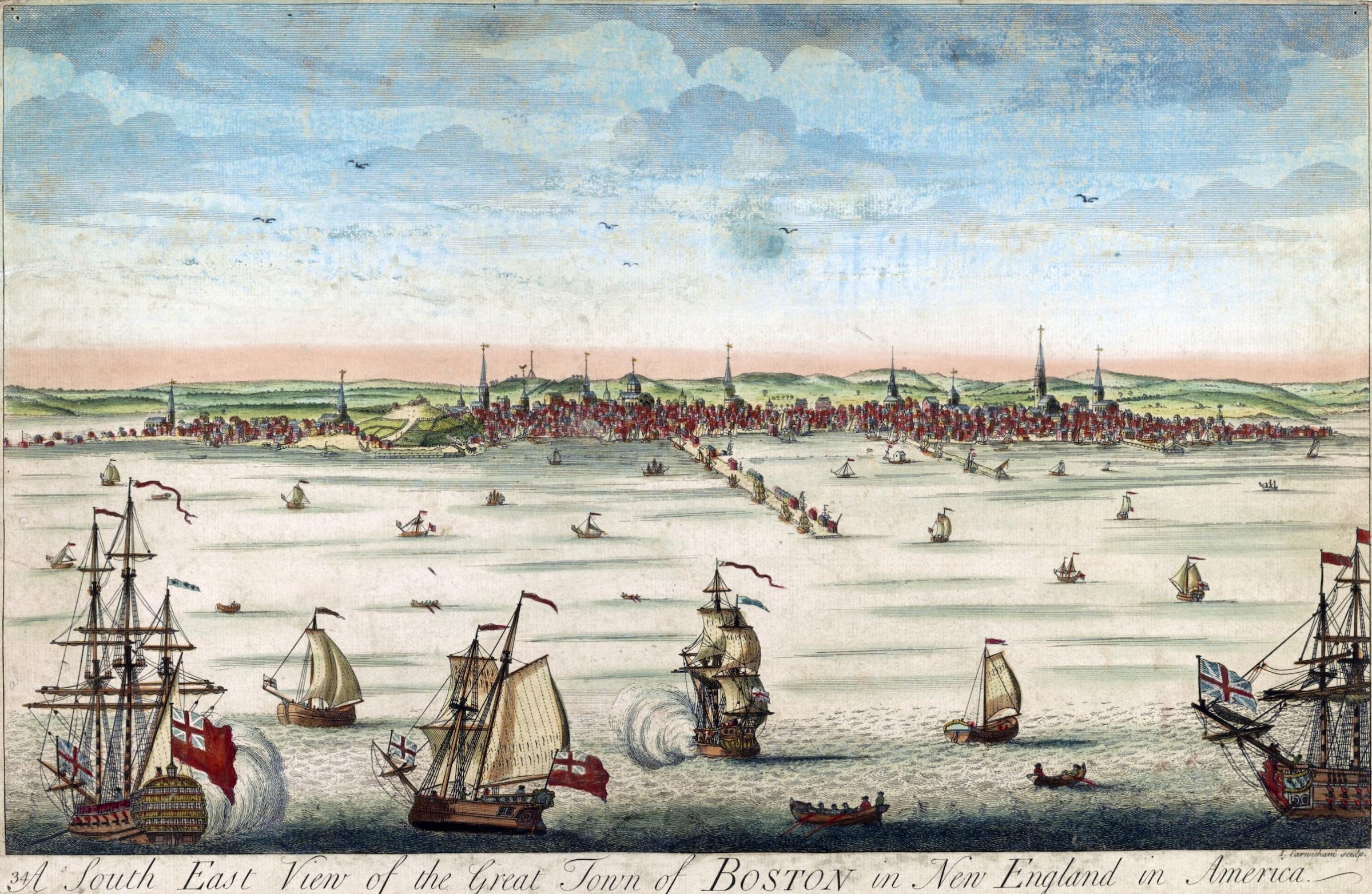 A view of Boston from the harbour, with ships in the foreground.