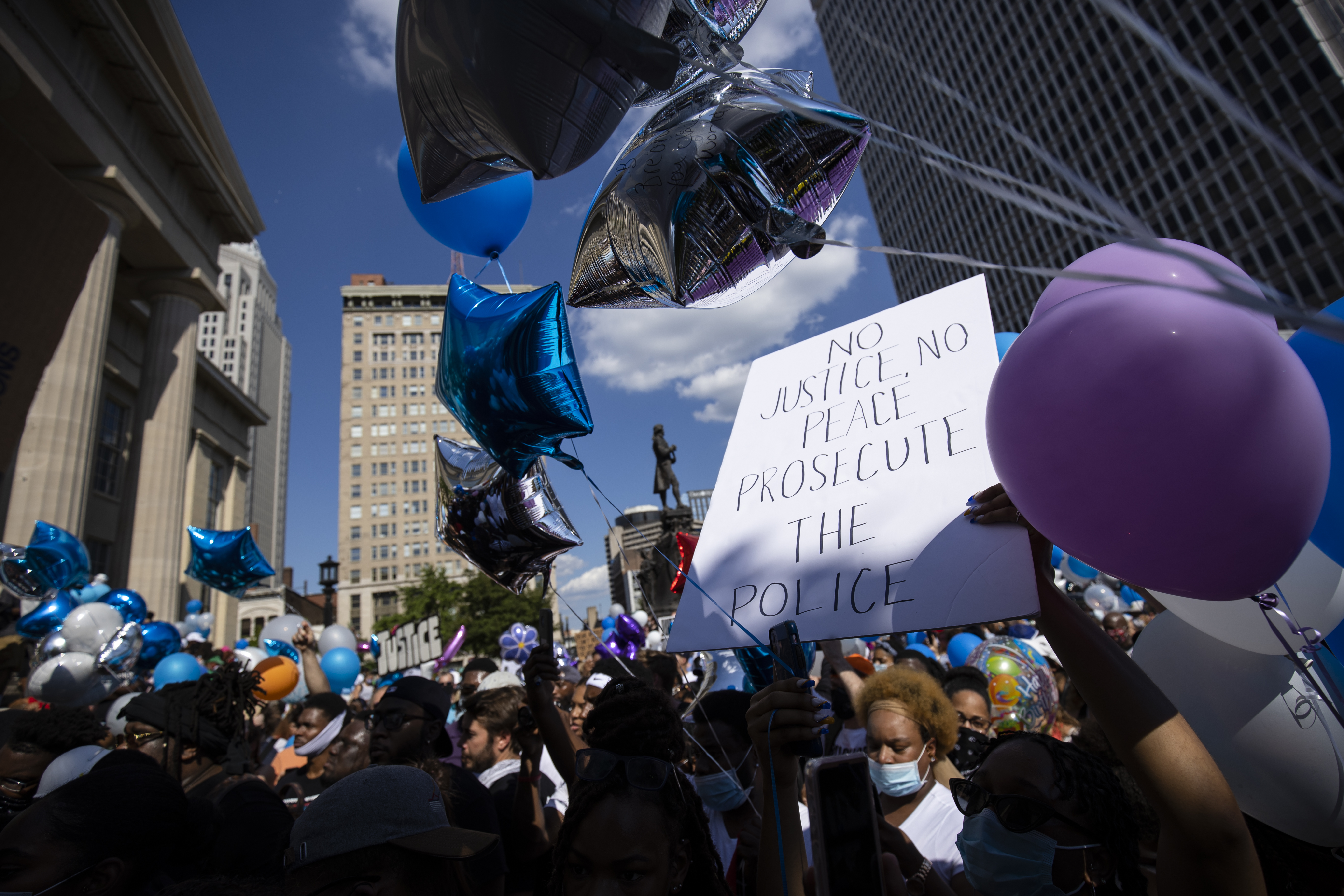 People gather with balloons for a vigil in memory of Breonna Taylor on June 6, 2020 in Louisville, Kentucky.