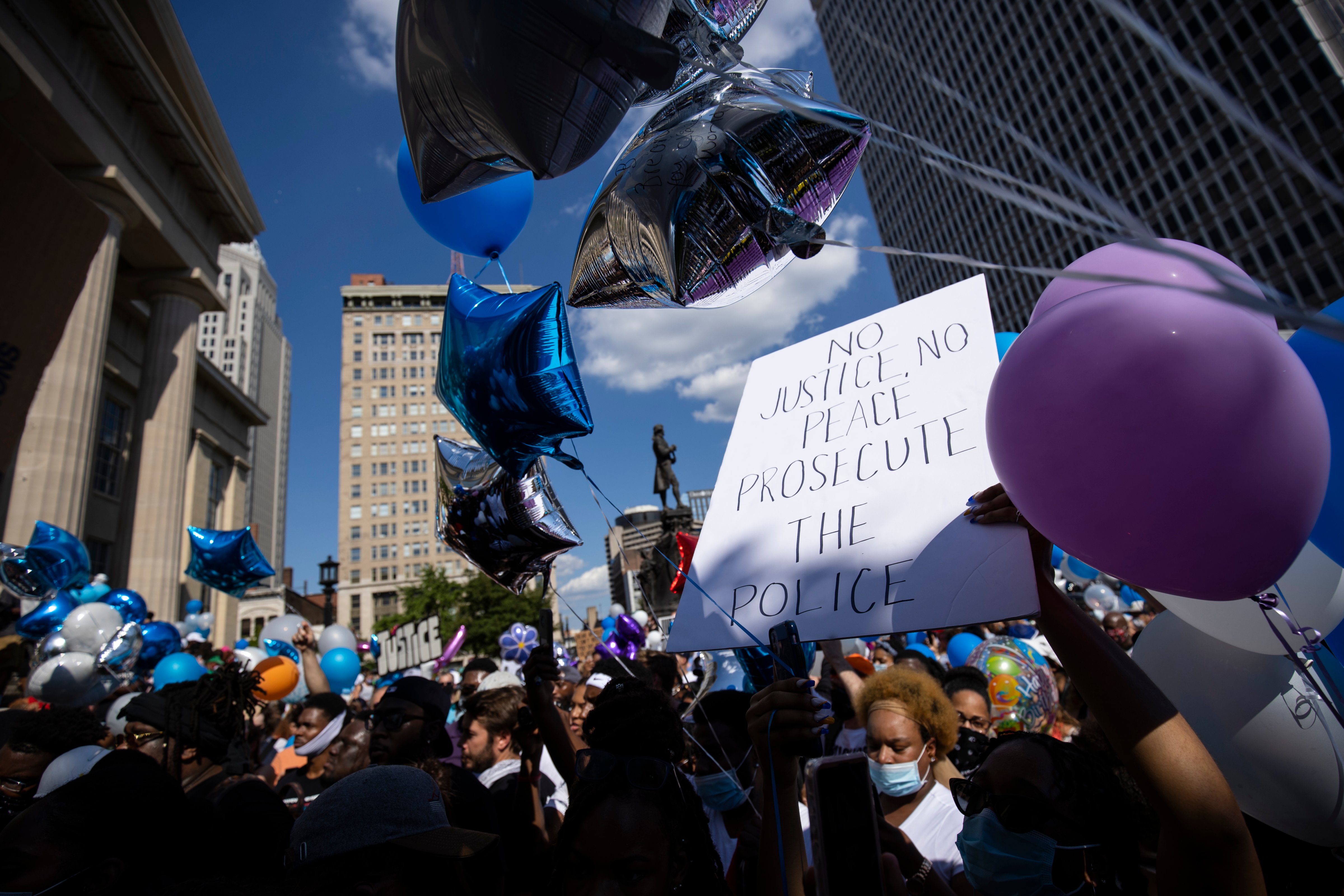 People gather with balloons for a vigil in memory of Breonna Taylor on June 6, 2020 in Louisville, Kentucky. (Brett Carlsen—Getty Images)