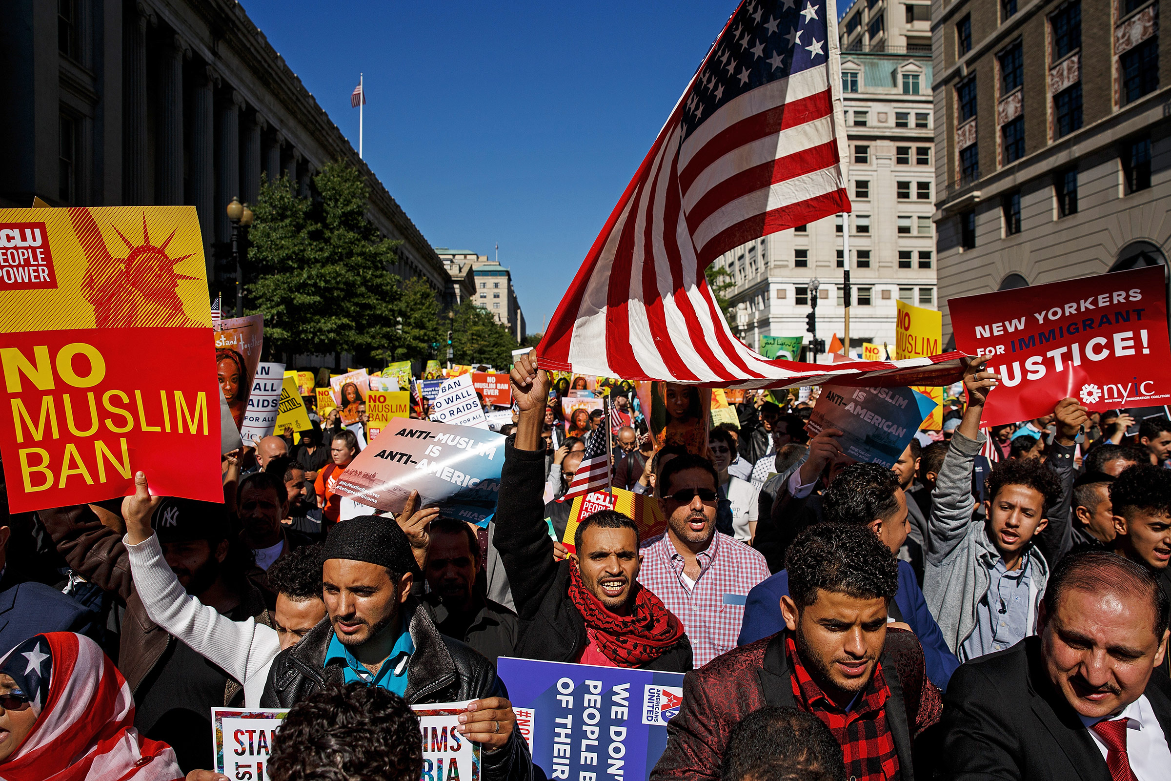 Protesters in Washington, D.C., march against Trump’s attempts to restrict travel from predominantly Muslim countries in October 2017 (Drew Angerer—Getty Images)