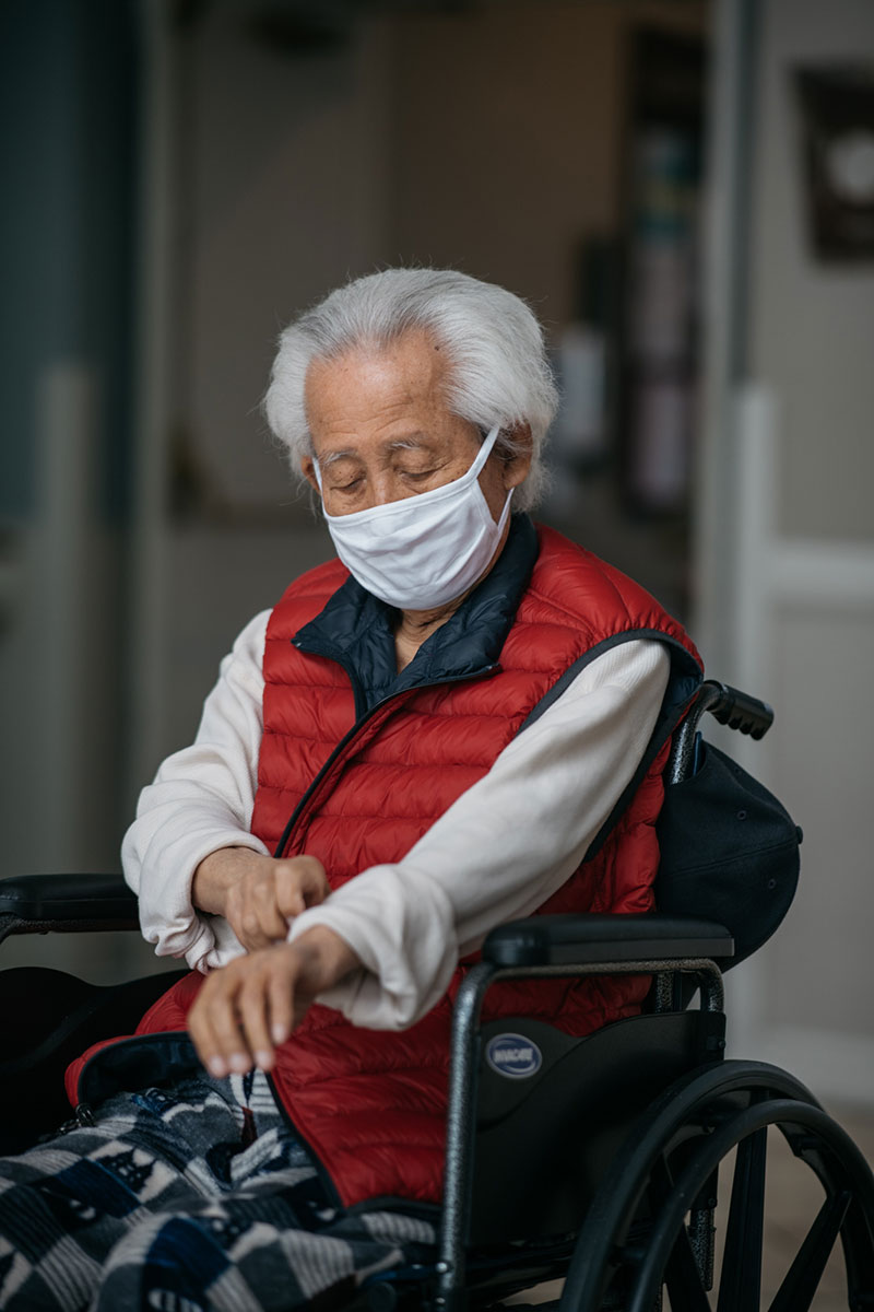 Noh Park, 92, prepares for his daughter's Father's Day visit at the Alexandria Care Center in Los Angeles. (Isadora Kosofsky for TIME)