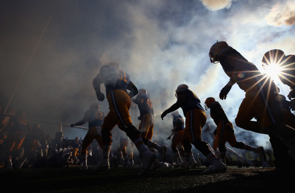 The California Golden Bears run out on to the field for their game against the UCLA Bruins at California Memorial Stadium on October 13, 2018 in Berkeley, California. (Ezra Shaw—Getty Images)