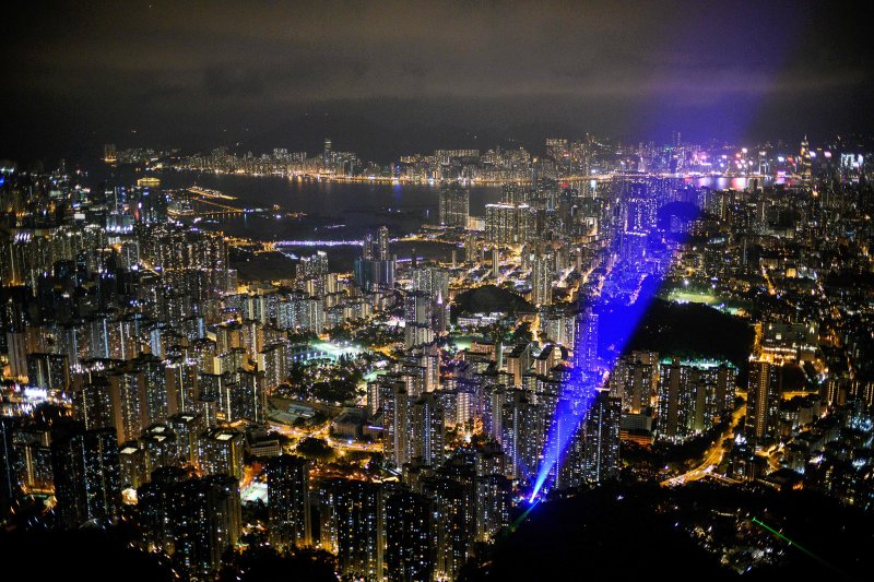 The Kowloon district of Hong Kong, seen from
                    Lion Rock during a pro-democracy gathering in September