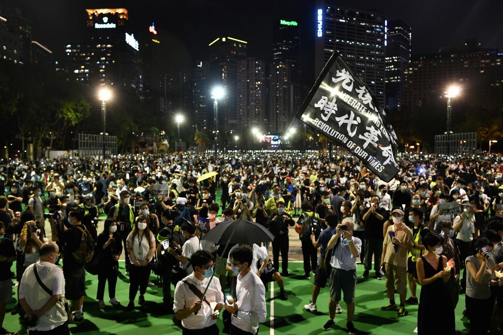 Activists hold a candlelit vigil in Victoria Park in Hong Kong on June 4, 2020. (ANTHONY WALLACE—AFP/Getty Images)