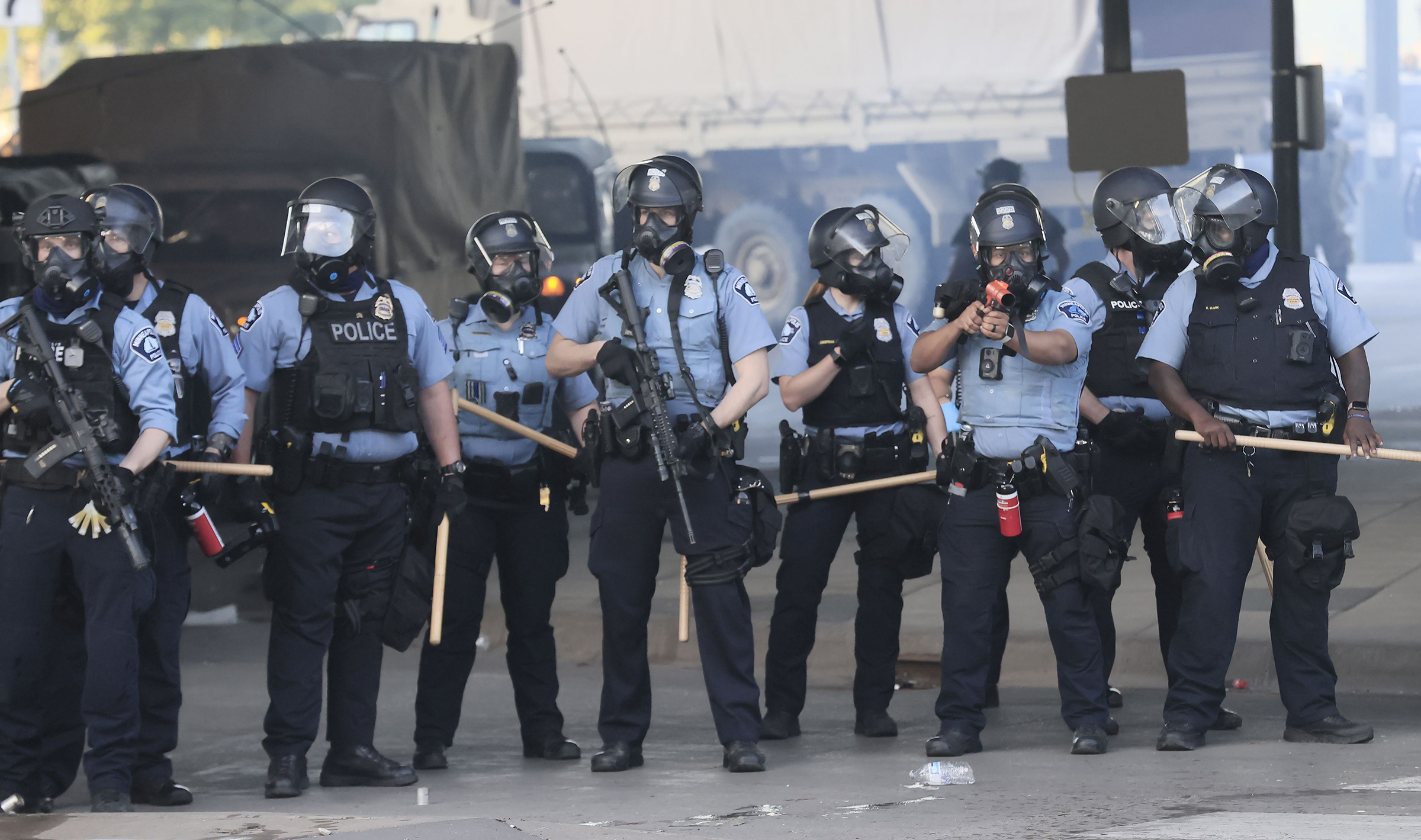 Members of the Minneapolis Police Department face off with protesters during a fourth day of protests over the arrest of George Floyd, who later died in police custody, in Minneapolis, Minnesota on May 29, 2020. (Tannen Maury—EPA-EFE/Shutterstock)