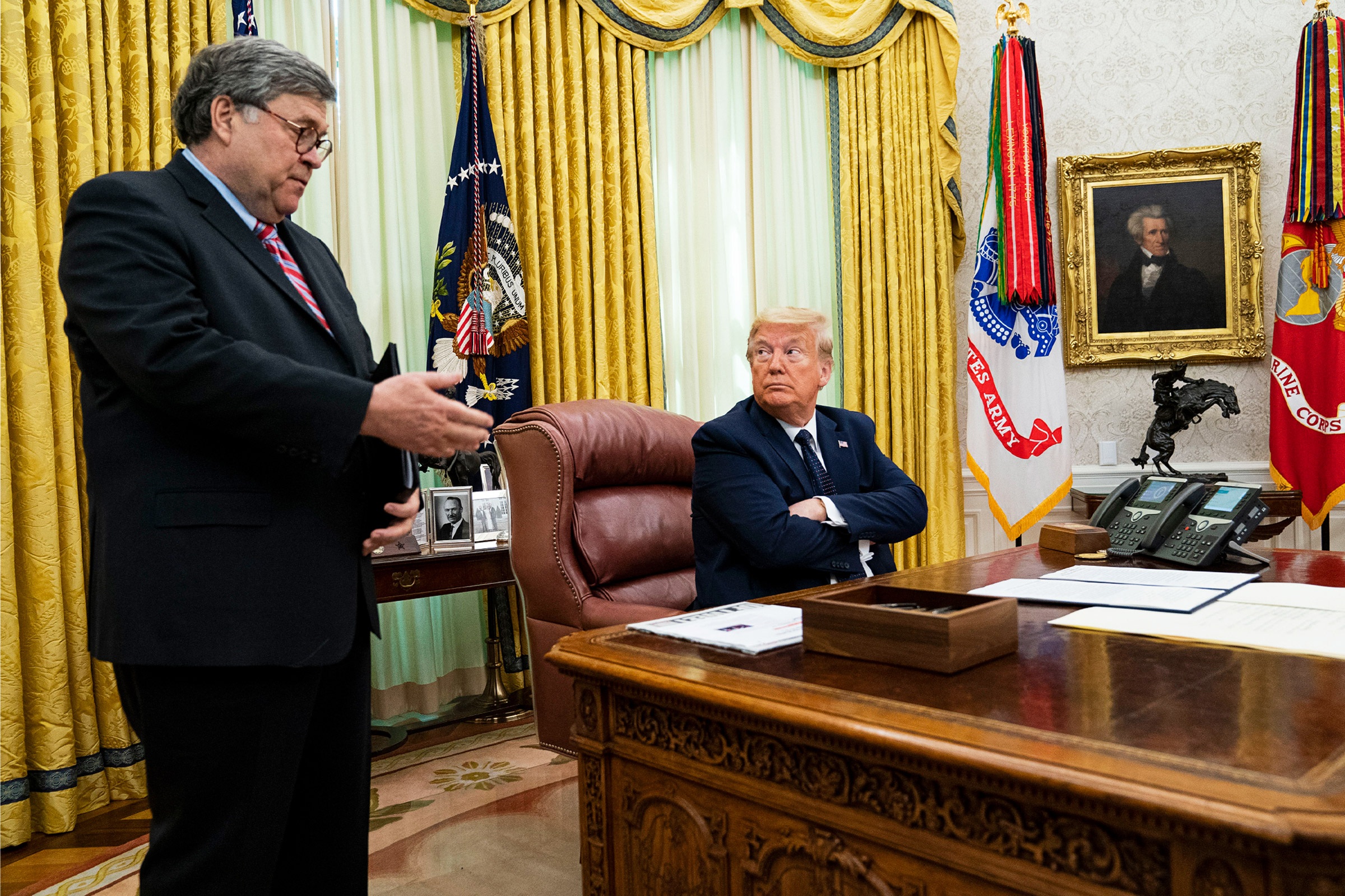 Protect Democracy has organized former Justice Department officials to speak out against Barr, left, and President Trump (Doug Mills—The New York Times/Redux)