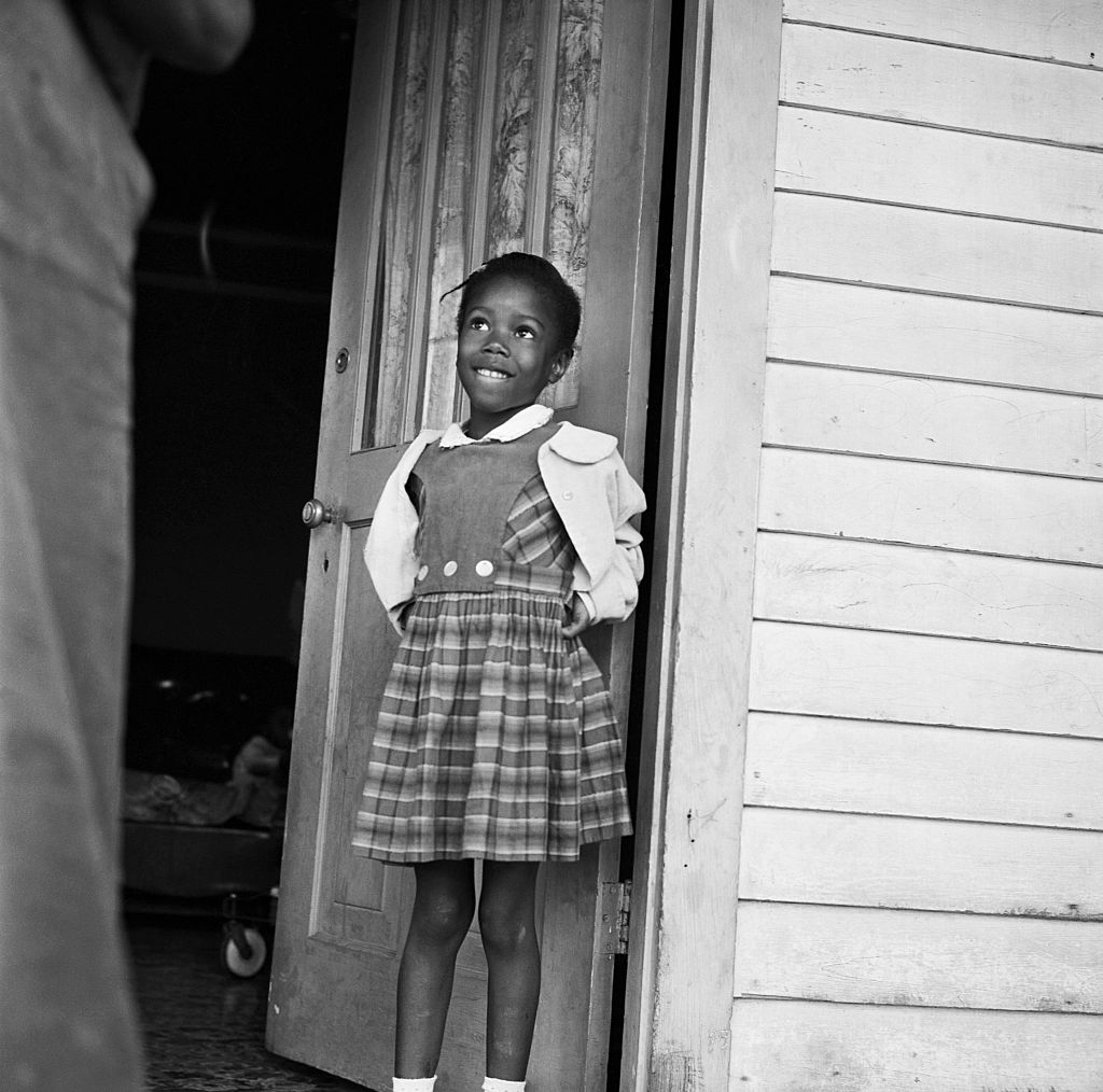 Ruby Nell Bridges at age 6, was the first African American child to attend William Franz Elementary School in New Orleans after Federal courts ordered the desegregation of public schools (Bettmann Archive)