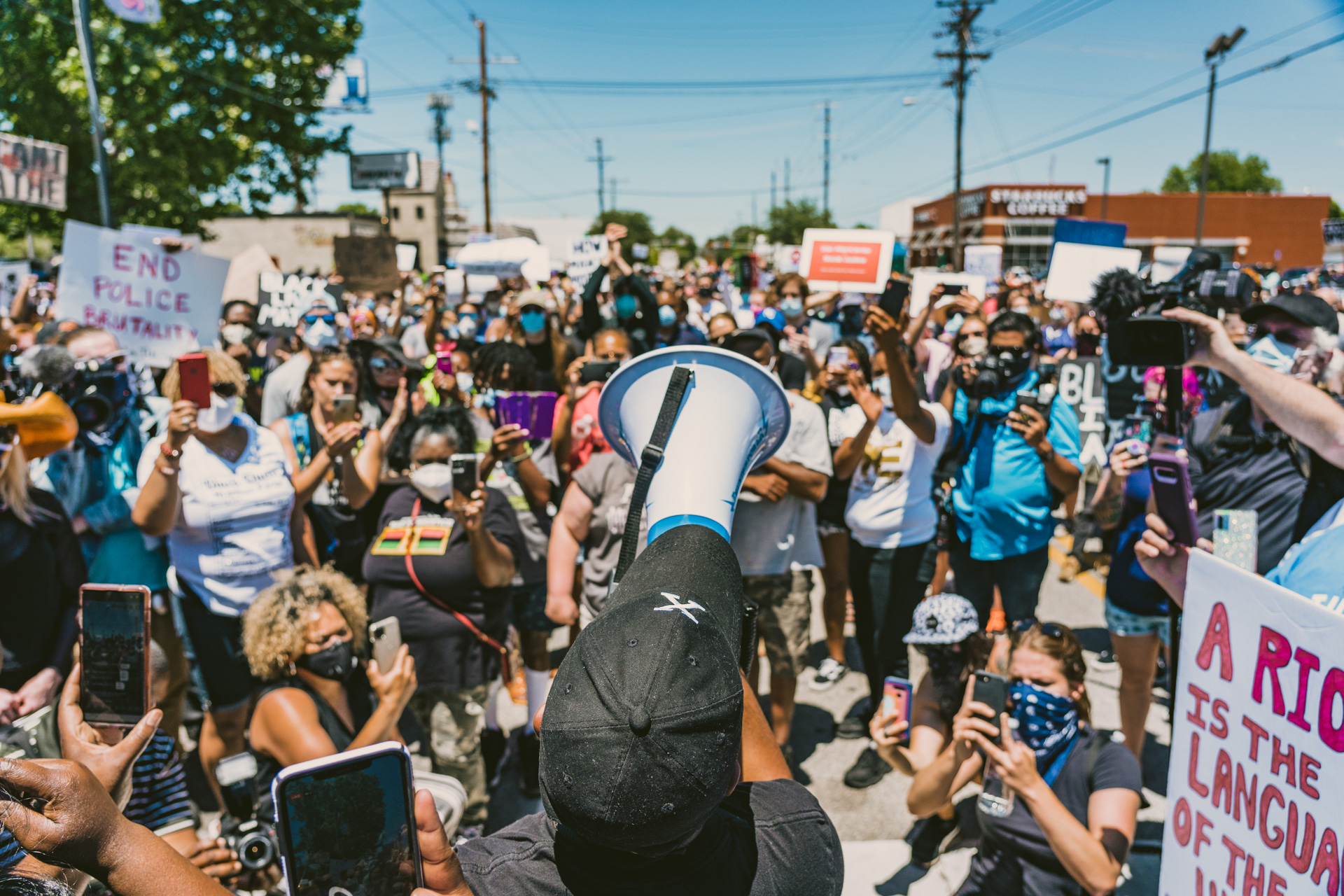 Tulsa activist Greg Robinson leads a protest in downtown Tulsa to protest racial in justice and police brutality in the wake of George Floyd's death. (CreeseWorks—The Black Wall Street Times)