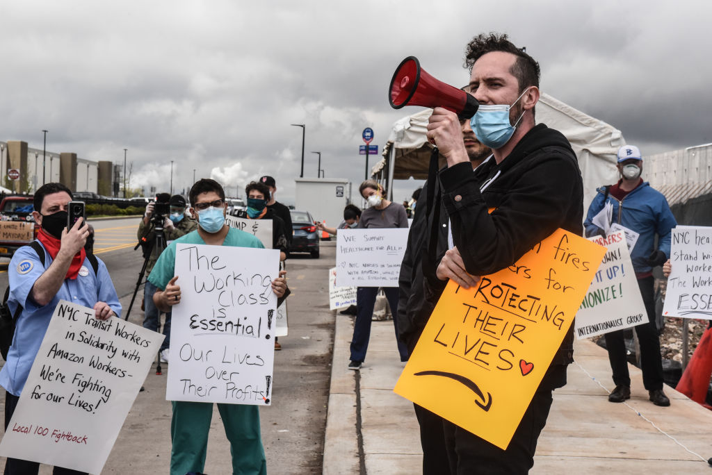 People protested working conditions outside of an Amazon warehouse fulfillment center on  Staten Island in May (Stephanie Keith—Getty Images)