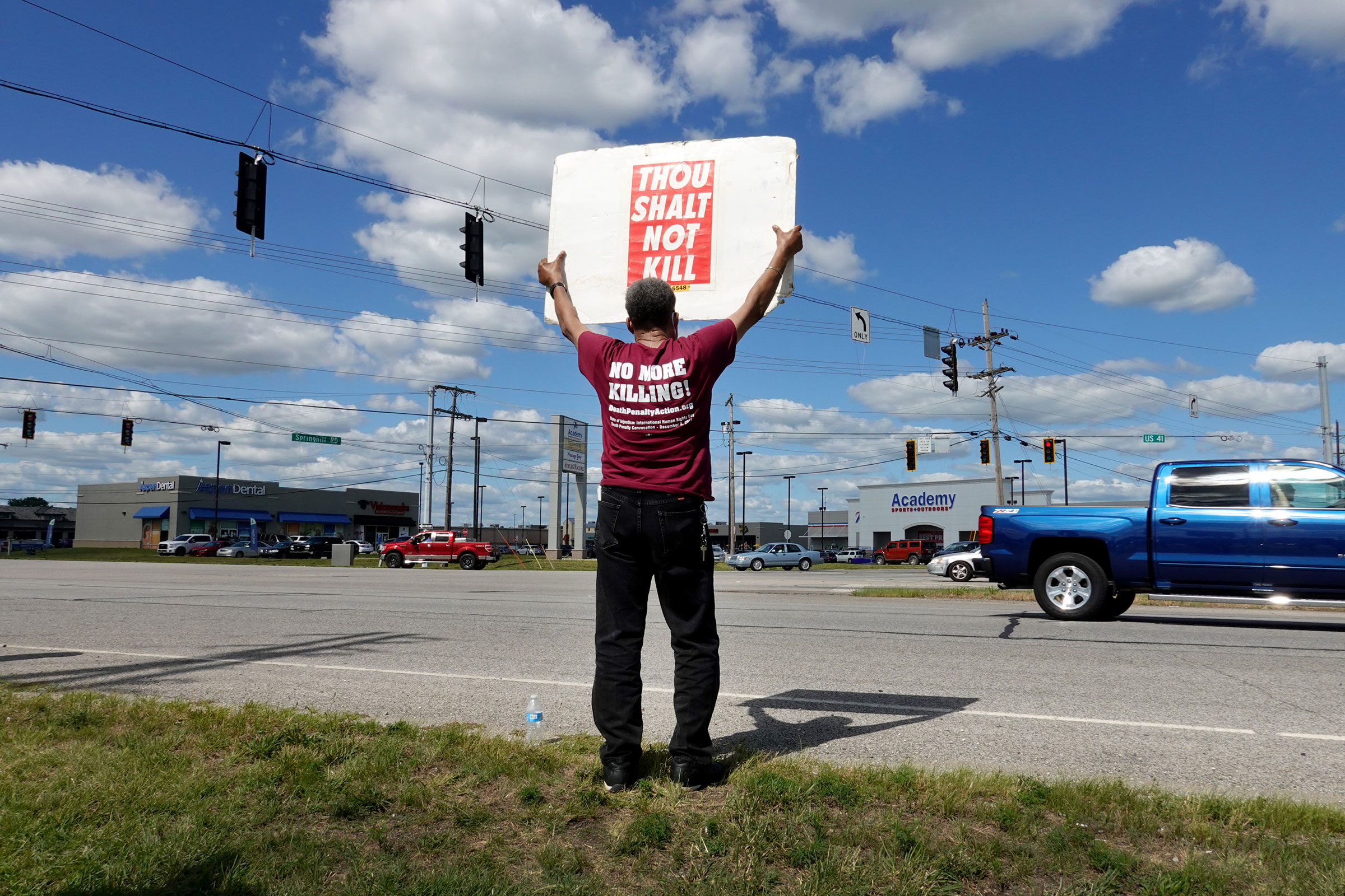 Sylvester Edwards expresses his opposition to the death penalty during a protest near the Federal Correctional Complex where Daniel Lewis Lee is scheduled to be executed on July 13, 2020 in Terre Haute, Indiana. Lee was convicted and sentenced to die for the 1996 killings in Arkansas of gun dealer William Mueller, his wife Nancy, and her 8-year-old daughter Sarah. He is scheduled to be the first federal prisoner put to death since 2003. (Scott Olson—Getty Images)