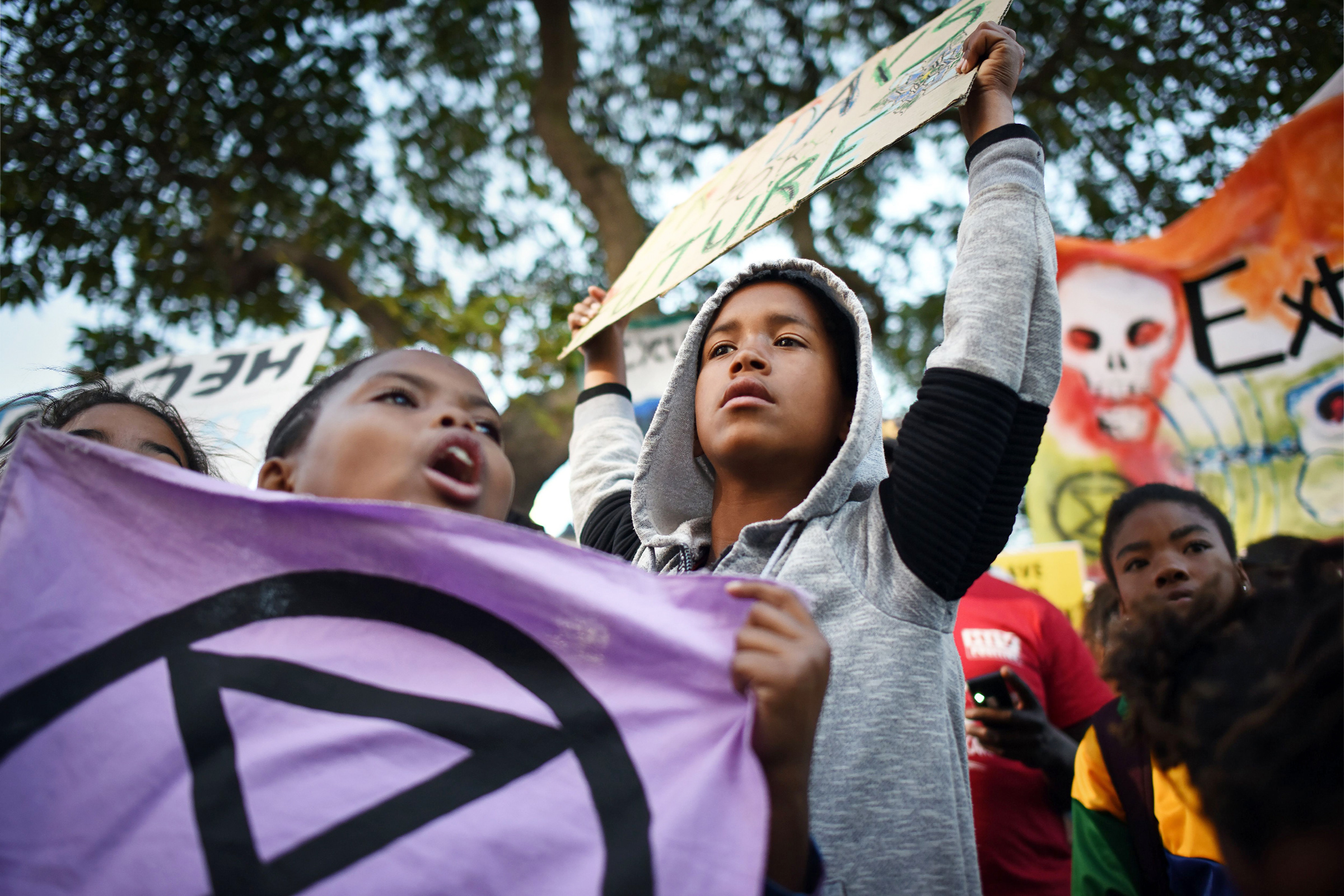 Young XR activists demonstrate outside South Africa’s Parliament in Cape Town on June 1. (Rodger Bosch—AFP/Getty Images)