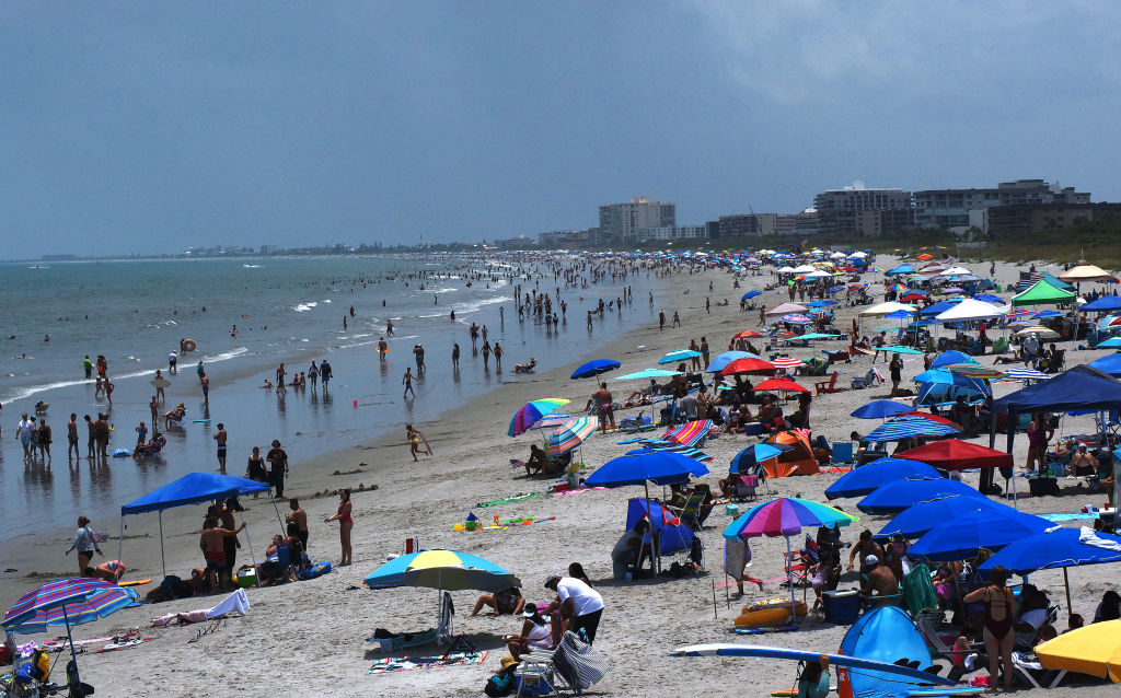 People celebrate Independence Day by visiting the beach on July 4, 2020 in Cocoa Beach, Fla. (Paul Hennessy—NurPhoto/Getty Images)