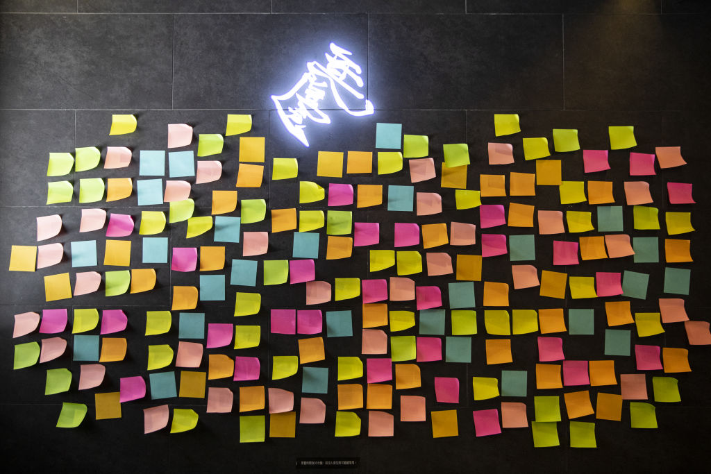 Blank sticky notes are displayed inside a restaurant in Hong Kong on July 8, 2020. (Chan Long Hei—Bloomberg/Getty Images)