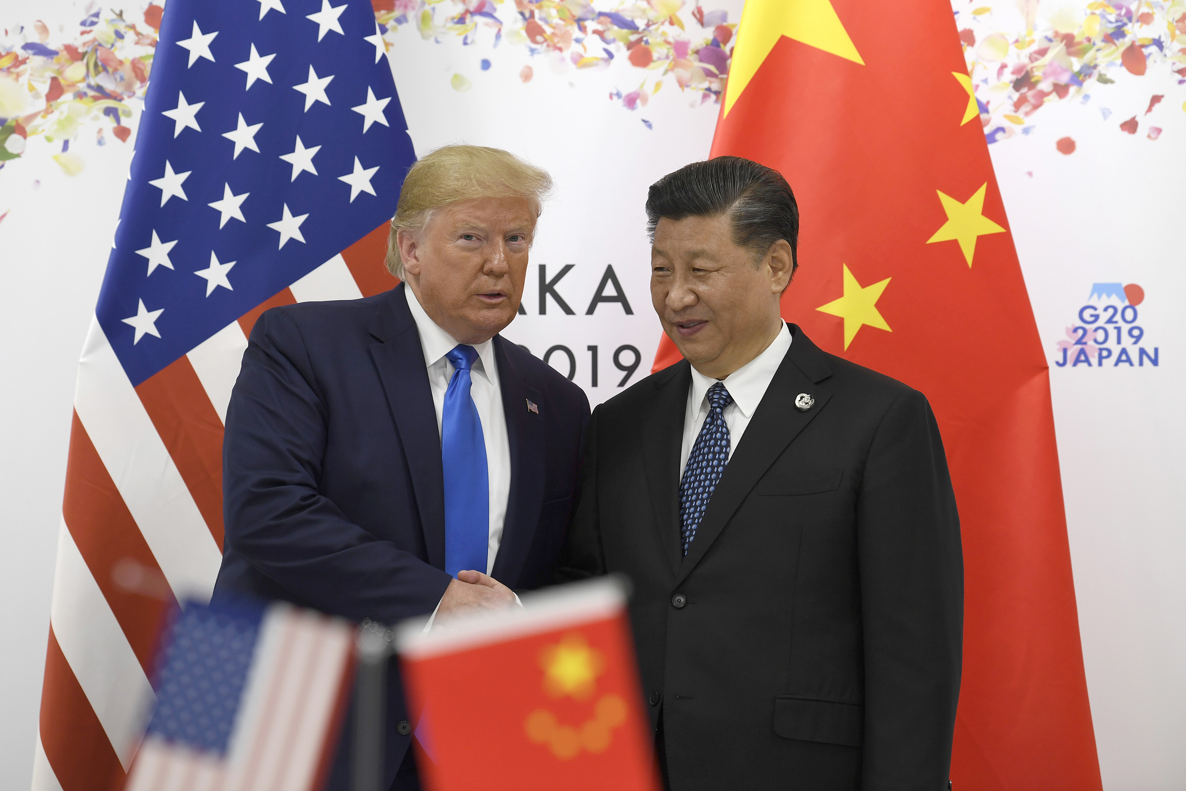 President Donald Trump poses for a photo with Chinese President Xi Jinping during a meeting on the sidelines of the G-20 summit in Osaka, Japan, on June 29, 2019. (Susan Walsh—AP)