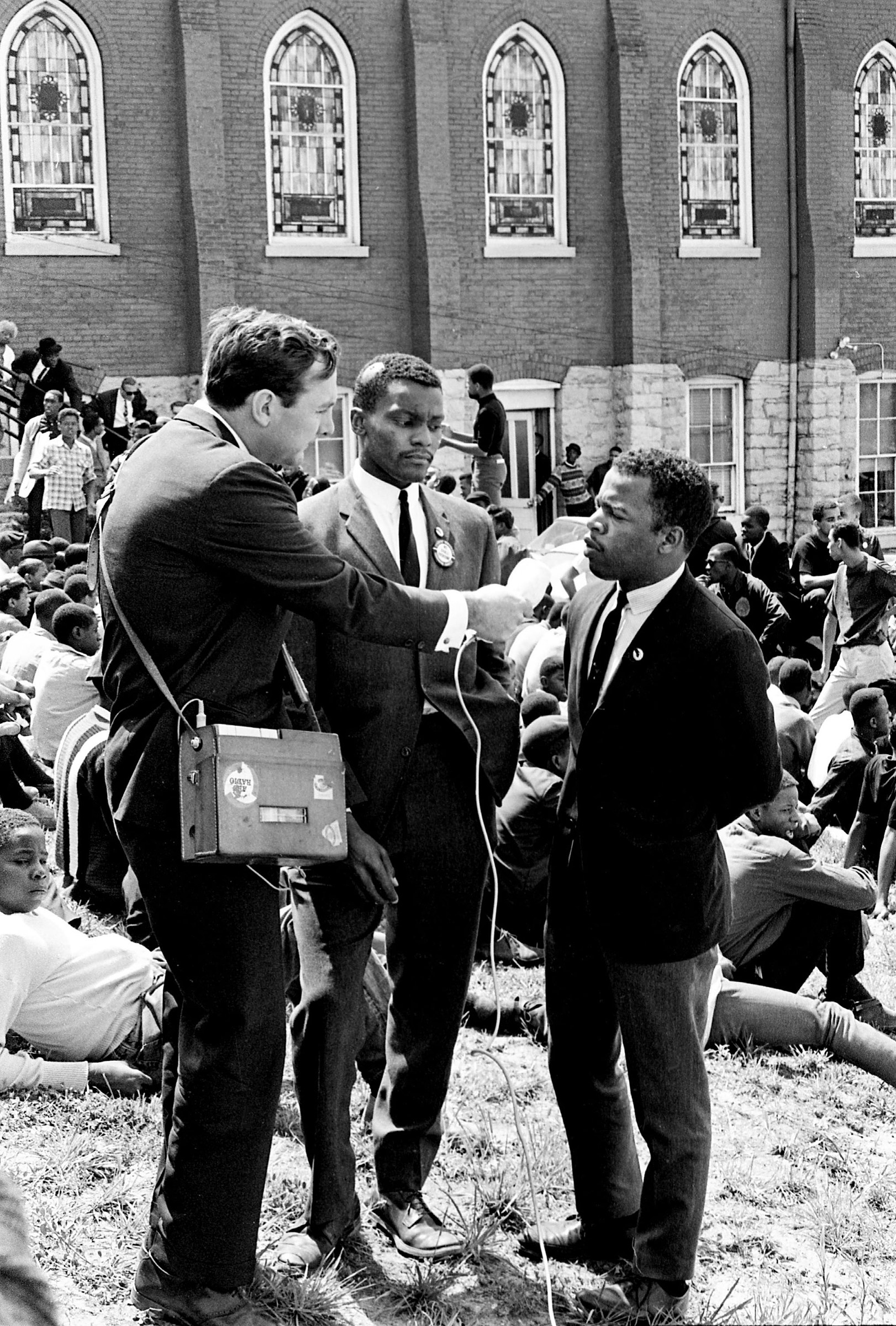 John Lewis, right, and Lester McKinnie, center, are interviewed by ABC News' Southern bureau chief Paul Good at the sit-in demonstrators' base at the First Baptist Church in Nashville, April 30, 1964.