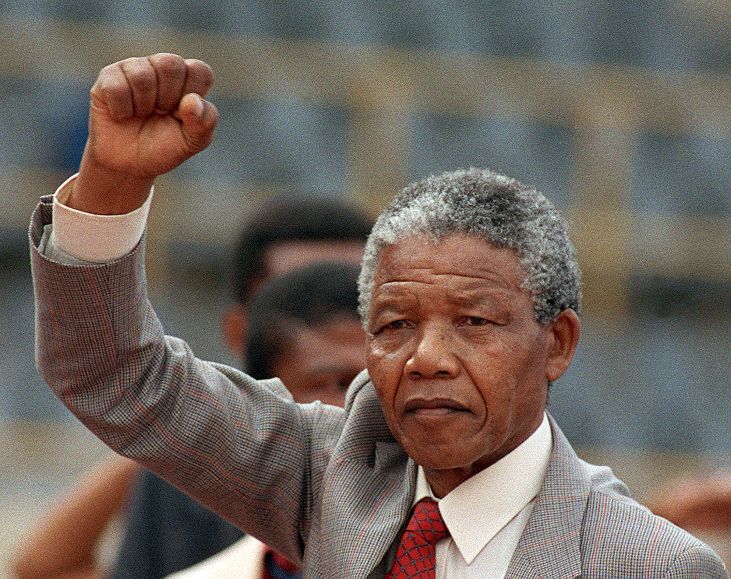 Anti-apartheid leader Nelson Mandela arriving to address a mass rally, a few days after his release from jail, on Feb. 25 1990,  in Bloemfontein, South Africa. (Trevor Samson—AFP via Getty Images)