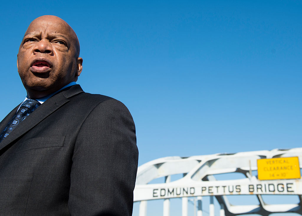 Rep. John Lewis, D-Ga., stands on the Edmund Pettus Bridge in Selma, Ala., in between television interviews on Feb. 14, 2015. (Bill Clark/CQ Roll Call—Getty Images)