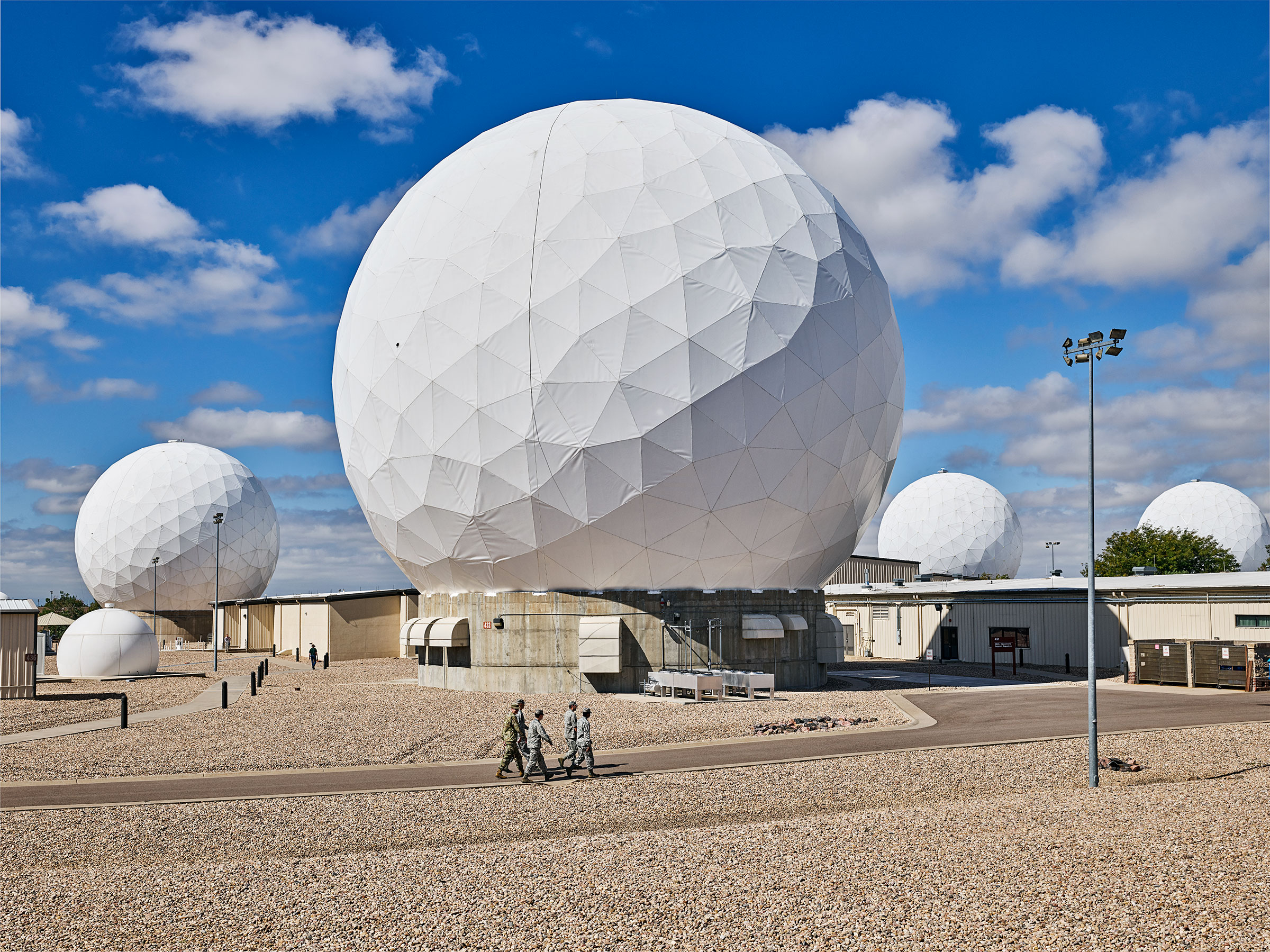 Radomes, called “golf balls,” at Buckley Air Force Base in Colorado protect 60-ft. military satellite dishes. (Spencer Lowell for TIME)
