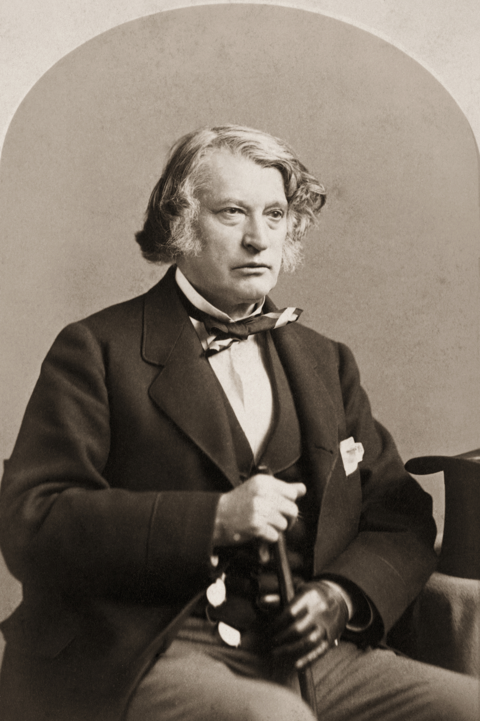 Charles Sumner seated with cane, circa early 1870's. (Bettmann Archive/Getty Images)
