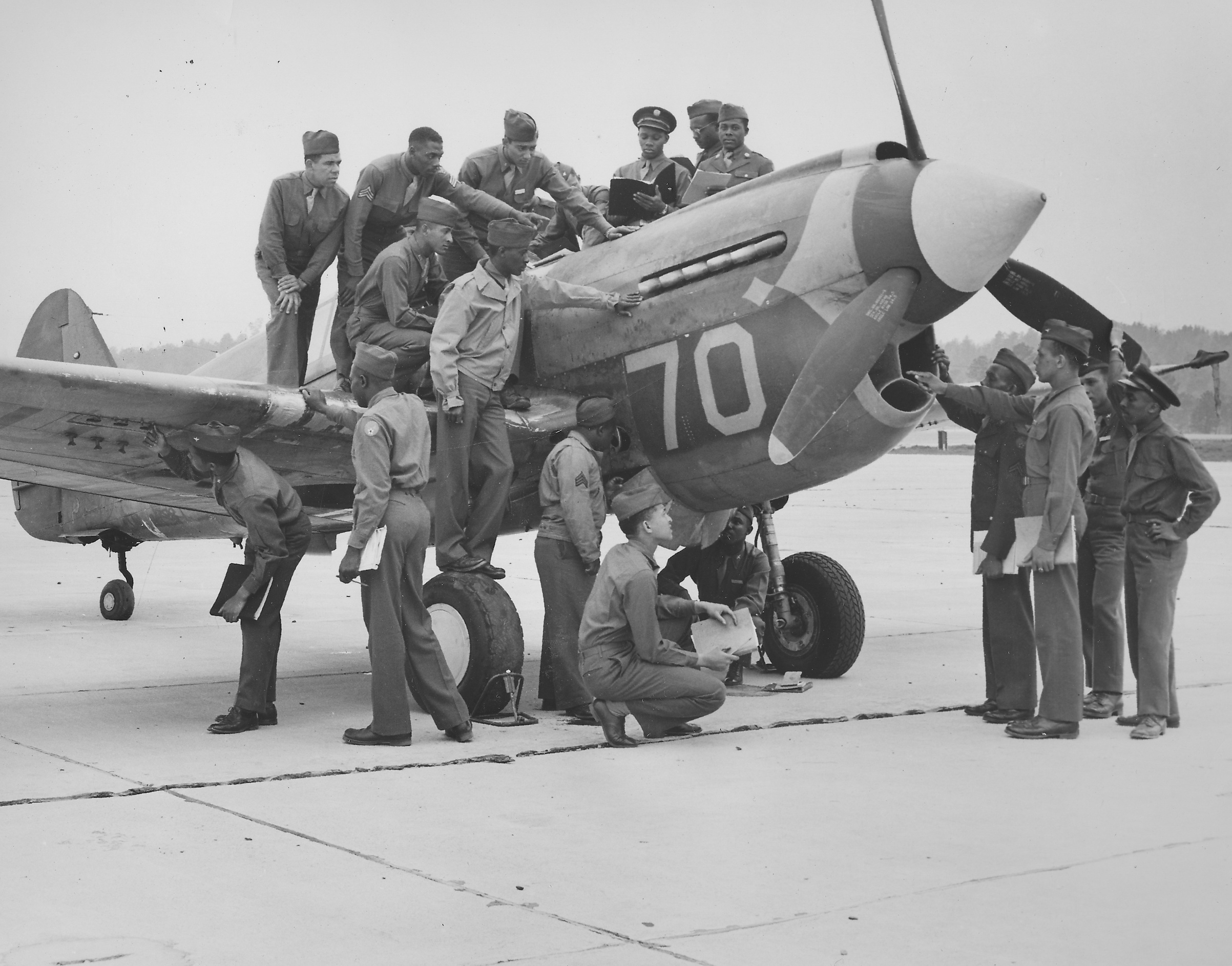 Tuskegee Airmen, with fighter airplane, at Tuskegee Army Flying School during World War II, Tuskegee, Ala., 1944. (Getty Images)