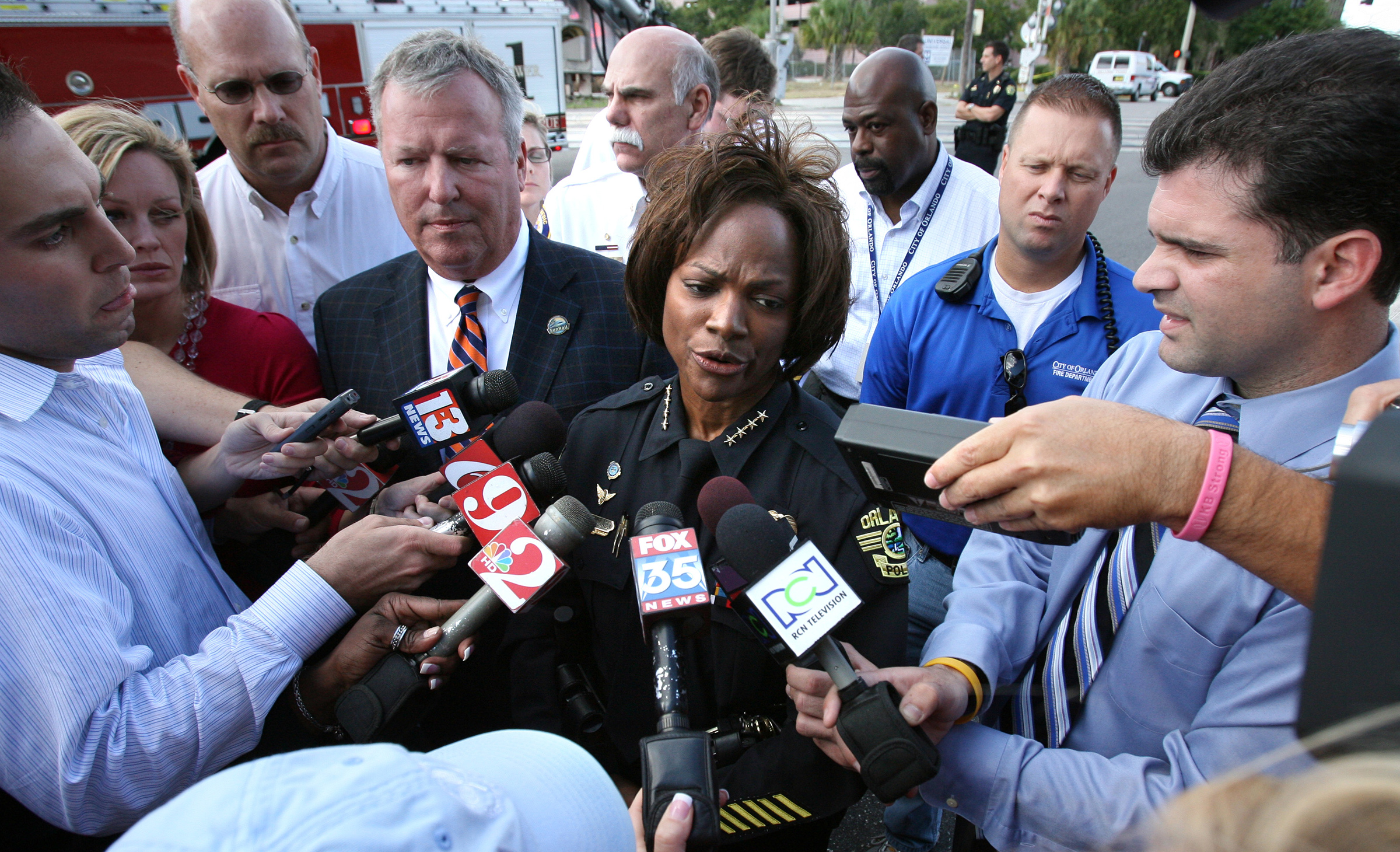 Demings at the scene of a mass shooting in Orlando’s Gateway Center in 2009