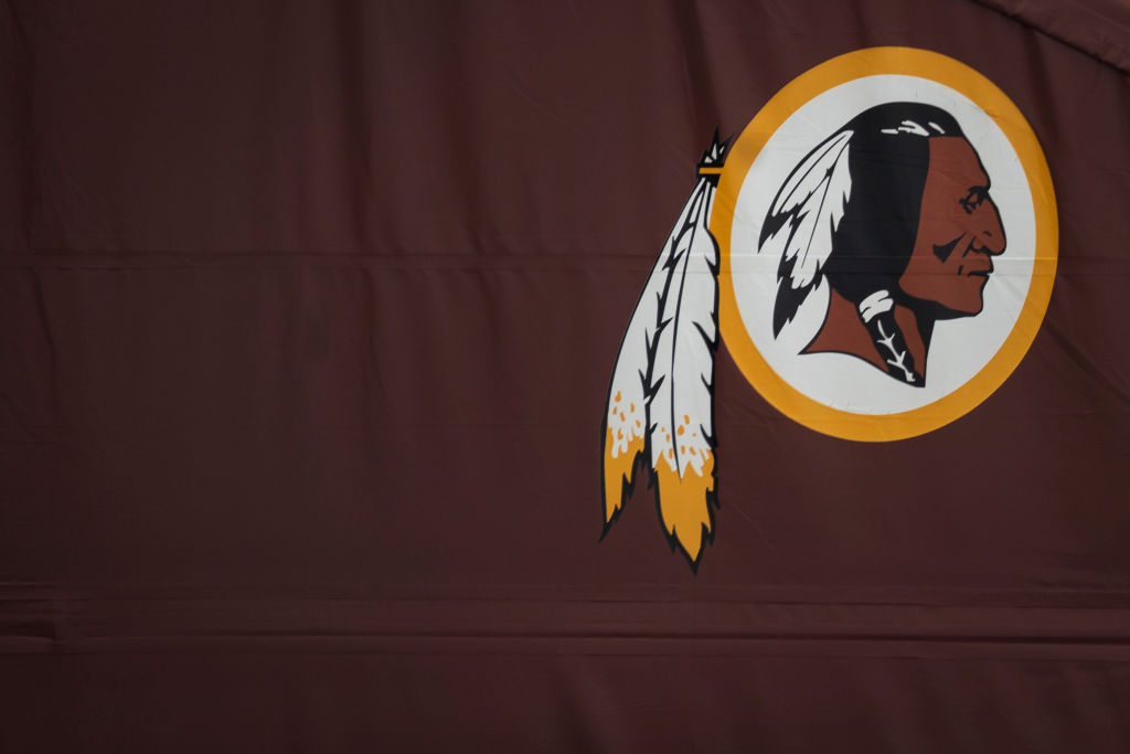 A Washington Redskins logo is seen on the outside of FedEx Field on July 7, 2020 in Landover, Maryland. (Drew Angerer—Getty Images)