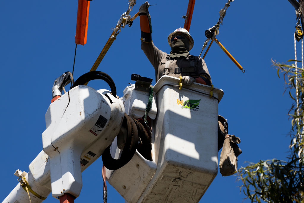 A Southern California Edison crew installs a new overhead switch for circuit reliability on May 13, 2020 in Ventura, Calif. (Brent Stirton—Getty Image)