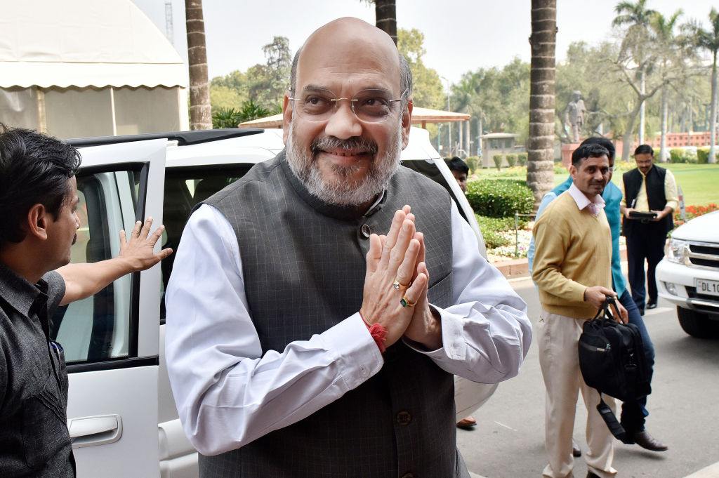 Home Minister Amit Shah gestures upon his arrival to attend the ongoing Budget session at Parliament on March 12, 2020 in New Delhi, India. (Mohd Zakir–Hindustan Times/Getty Images)