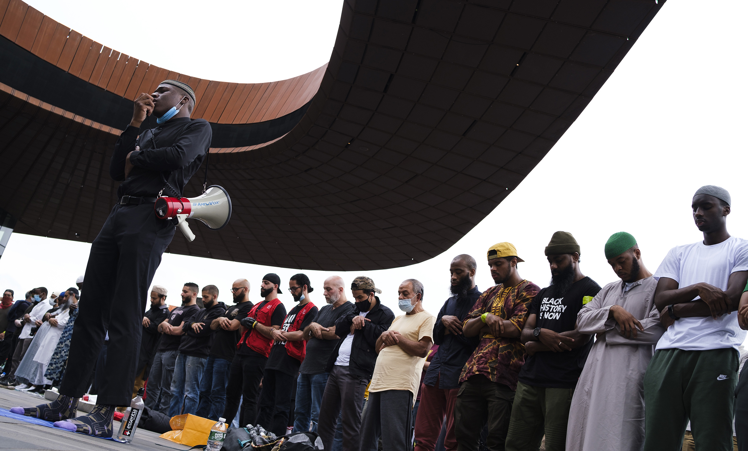 A group of Muslims gather for Friday prayers and Khutbah, and a subsequent Black Lives Matter march, outside of the Barclay's Center in Brooklyn, New York, June 5, 2020.
