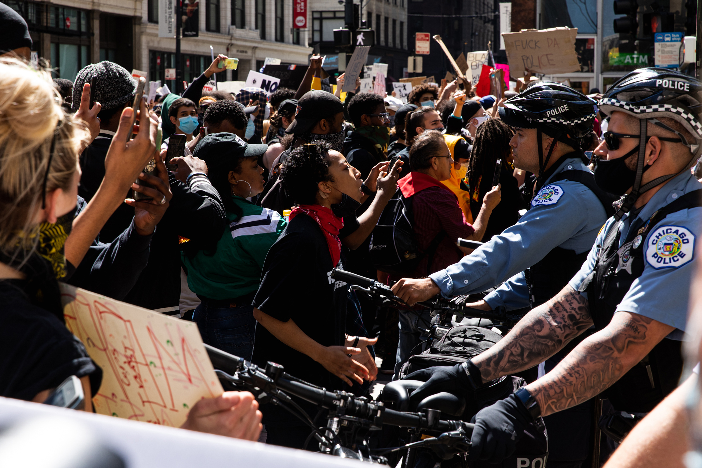 Protesters and Chicago Police clash during protests following the killing of George Floyd on May 30 in Chicago (Natasha Moustache—Getty Images)