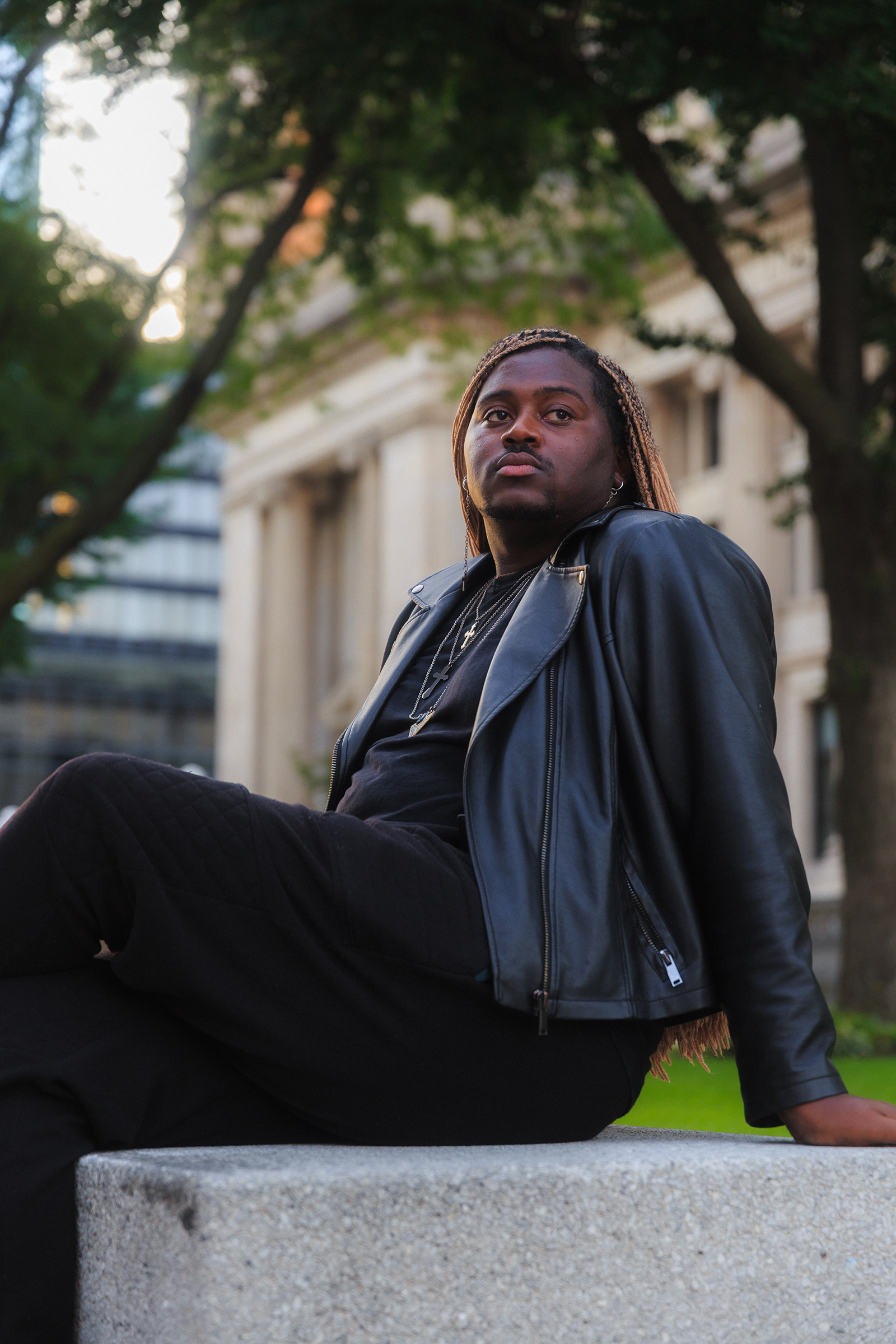 D’Angelo Sandidge sits in front of the U.S. District Courthouse in Indianapolis, near the site of his arrest on June 2.