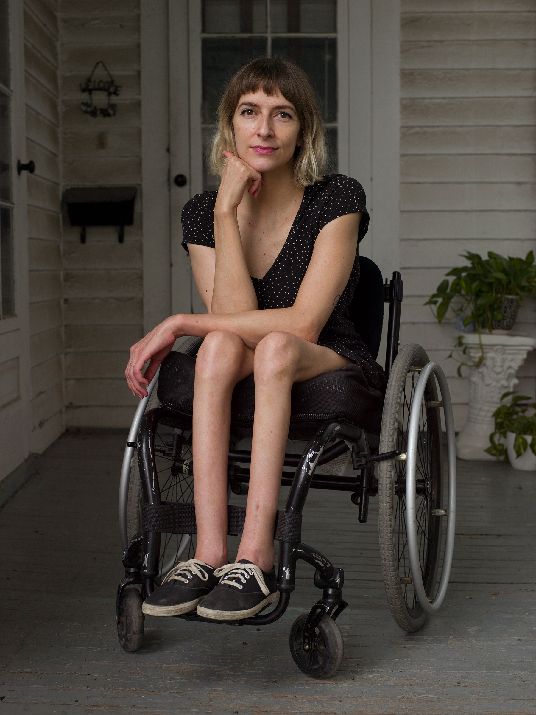 Taussig outside her home in Kansas City, Mo., on Aug. 6 (Jess Dugan for TIME)