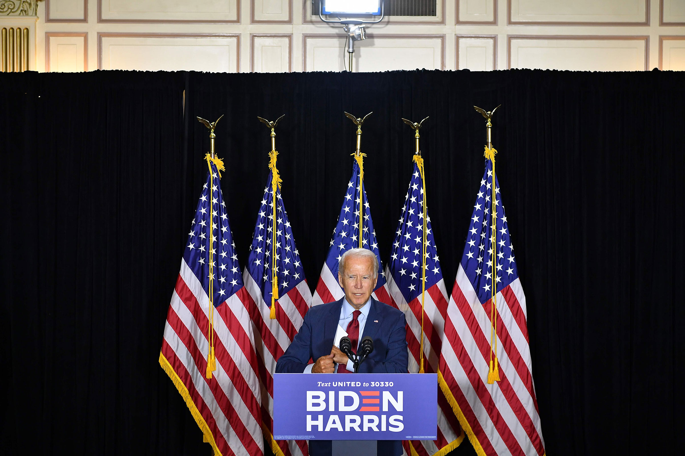 Democratic presidential nominee, former US Vice President Joe Biden, speaks to the press after receiving a briefing on COVID-19 in Wilmington, Delaware, on Aug. 13, 2020. (Mandel Ngan—AFP/Getty Images)