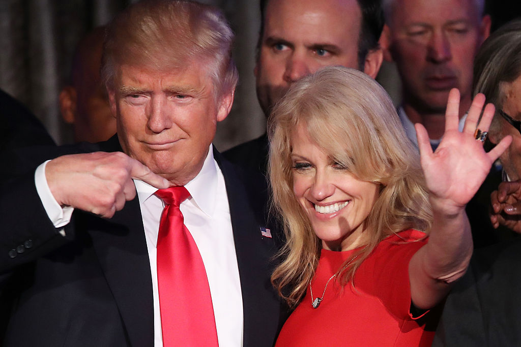 Republican president-elect Donald Trump along with his campaign manager Kellyanne Conway acknowledge the crowd during his election night event at the New York Hilton Midtown in the early morning hours of November 9, 2016 in New York City. (Mark Wilson–Getty Images)