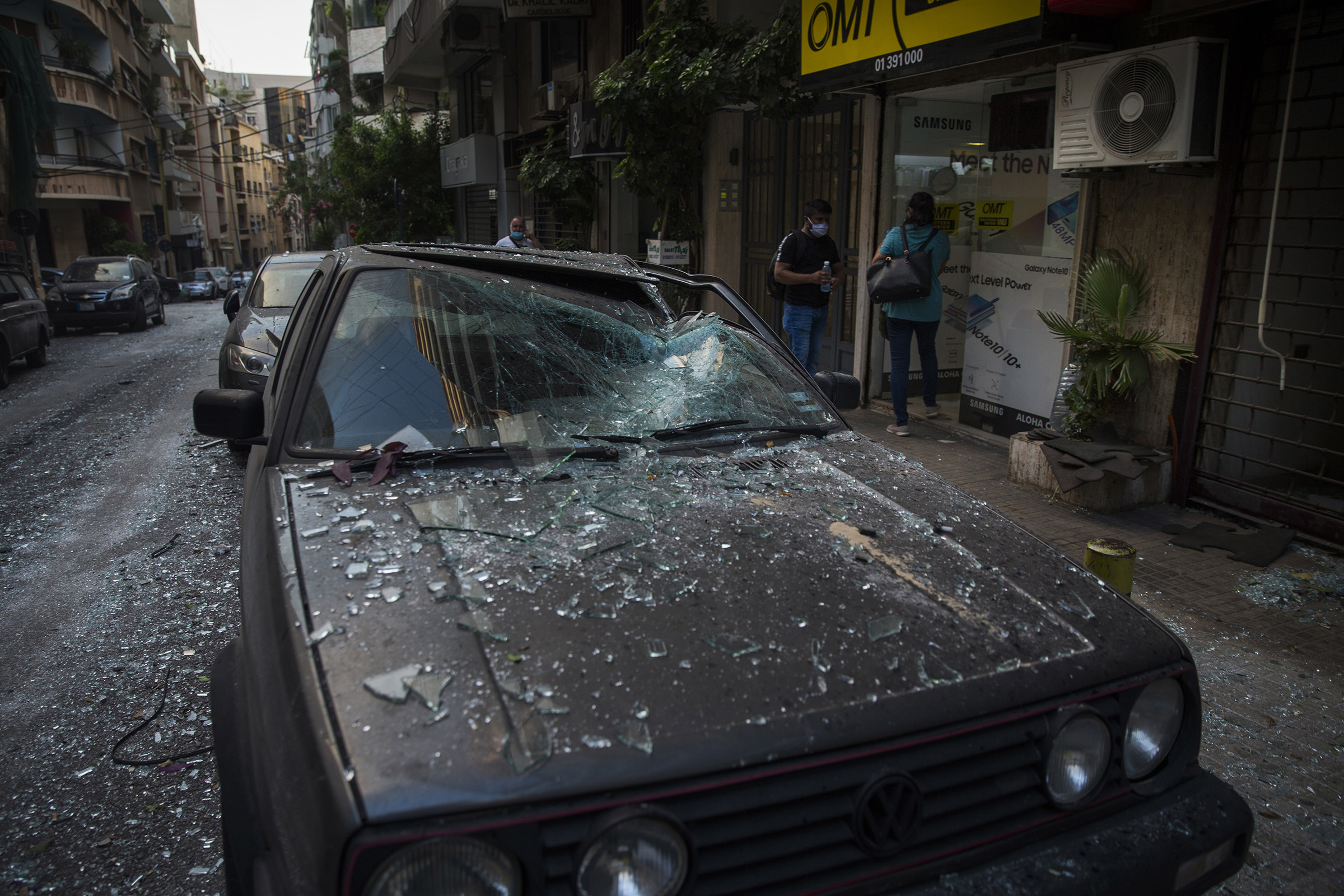 A car is damaged after the explosion. (Daniel Carde—Getty Images)